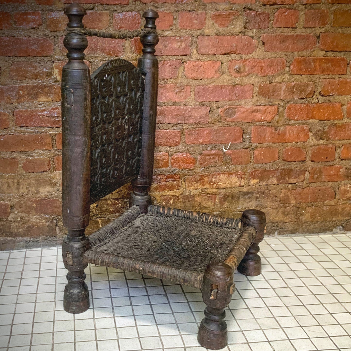 Low antique Indian chair