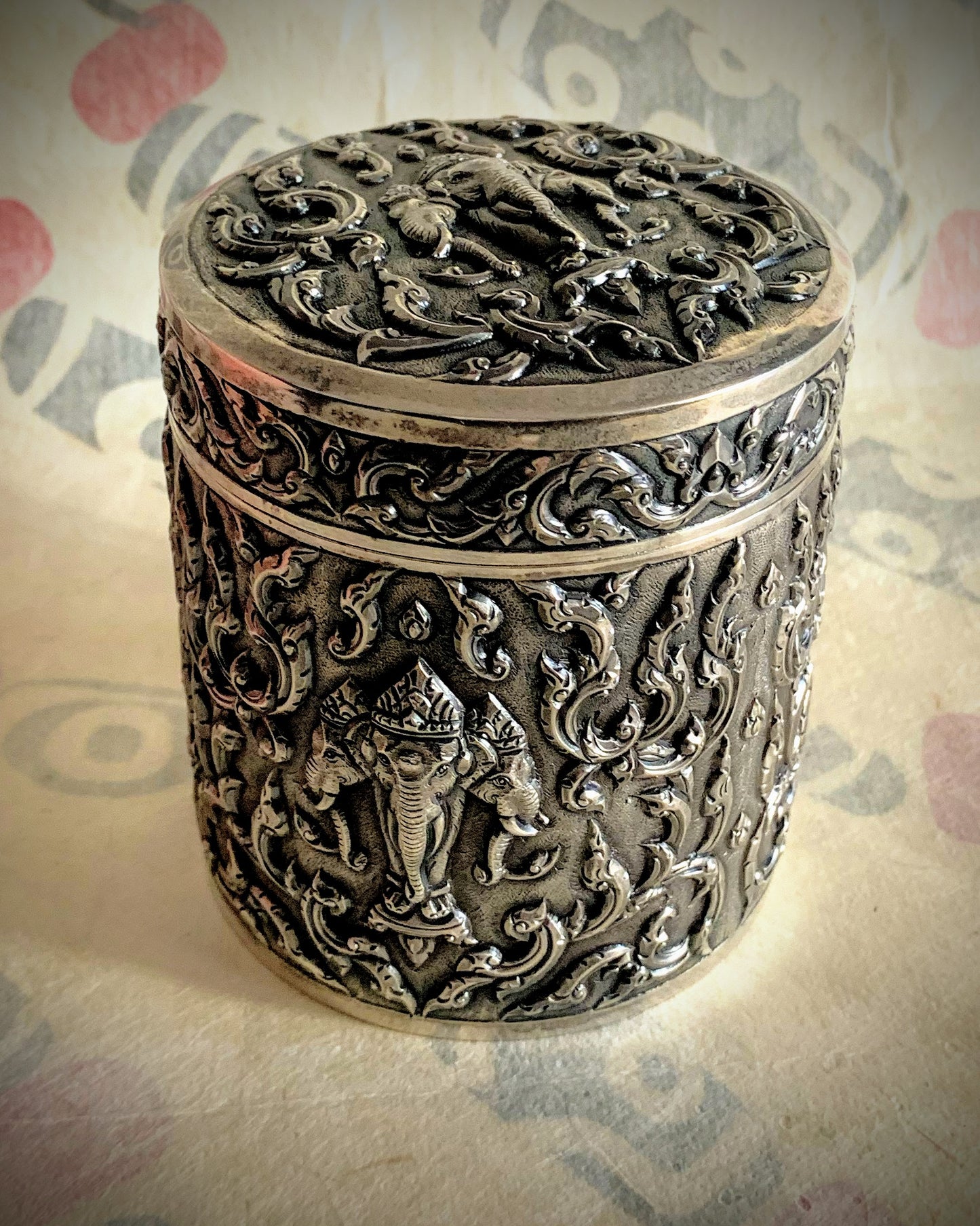 An antique cylindrical Thai silver box