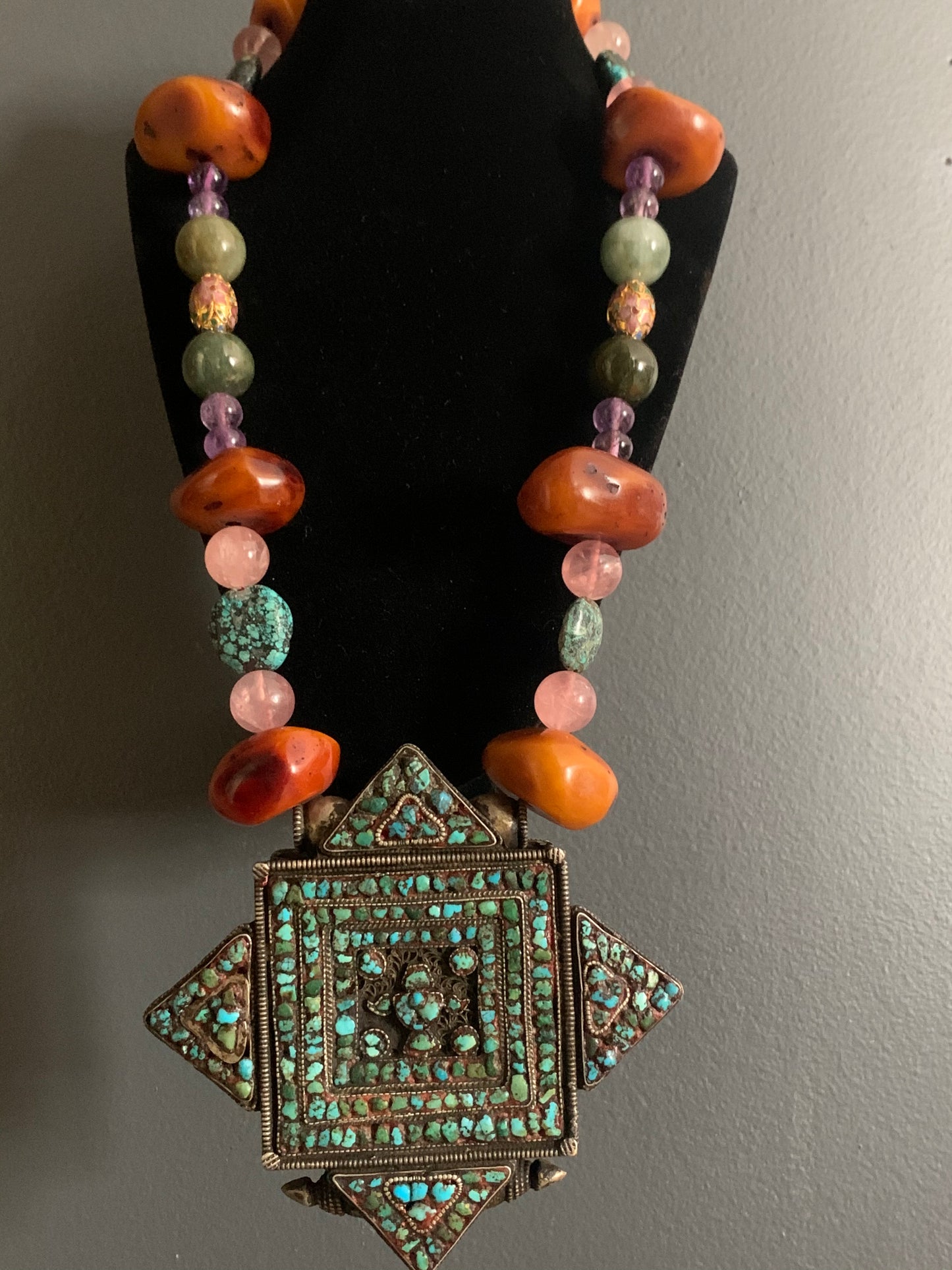 A vintage Tibetan ghau necklace