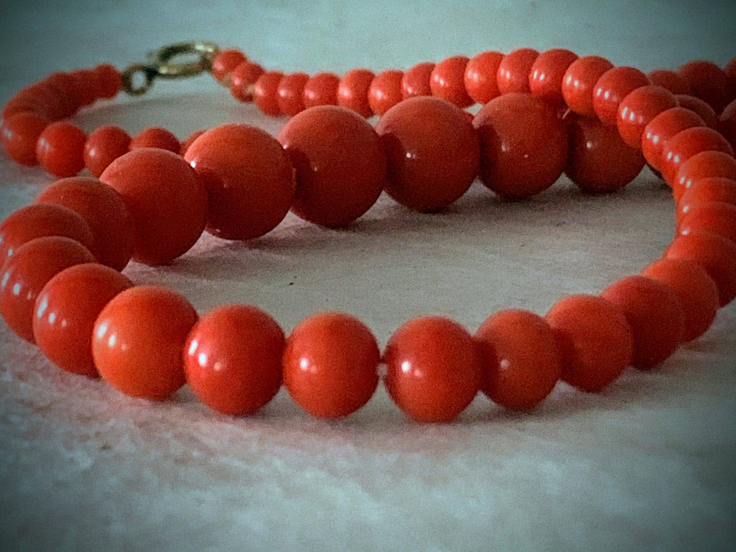 A 16” long antique coral necklace