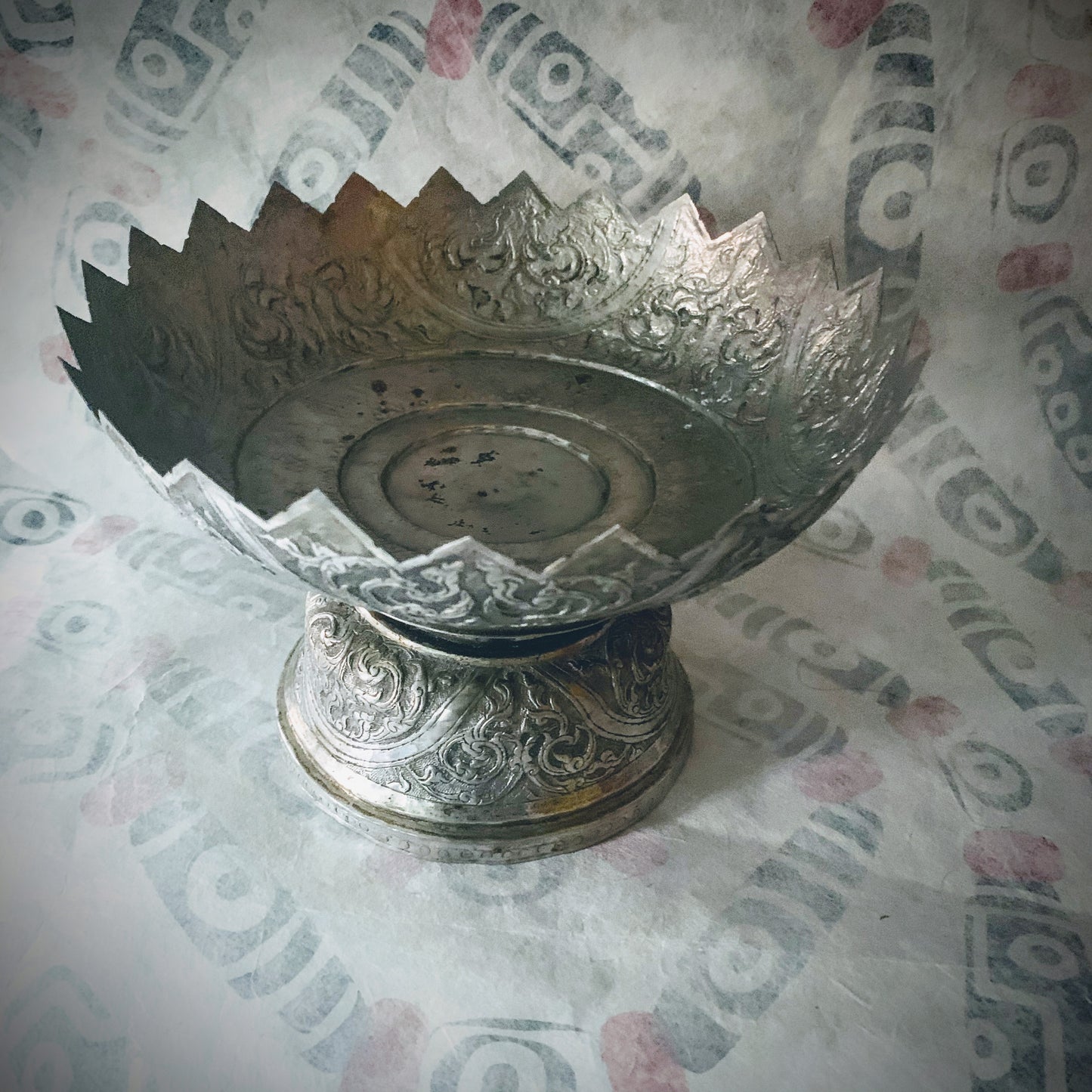 An antique silver fruit bowl stand