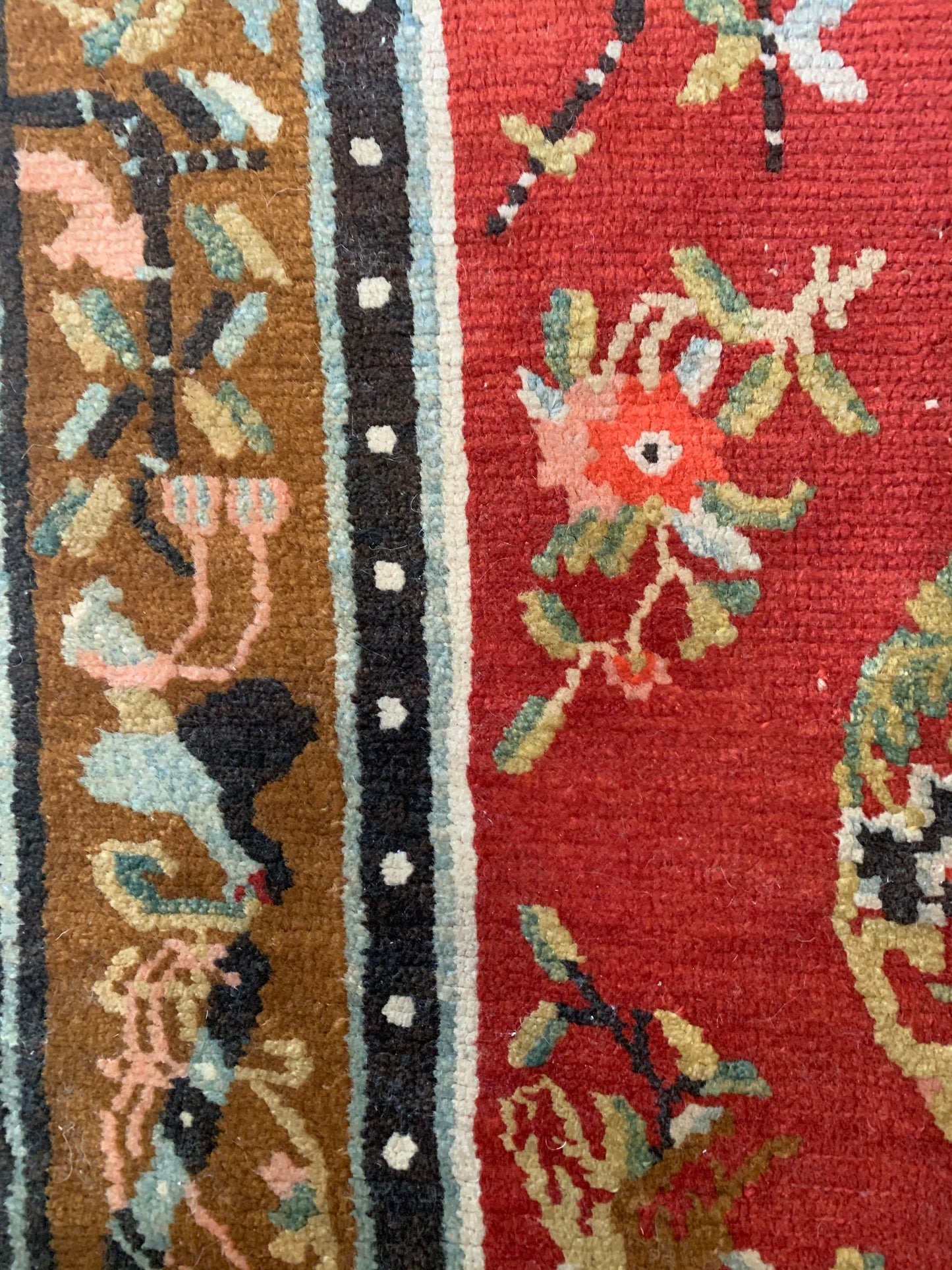 An antique Tibetan wool rug
