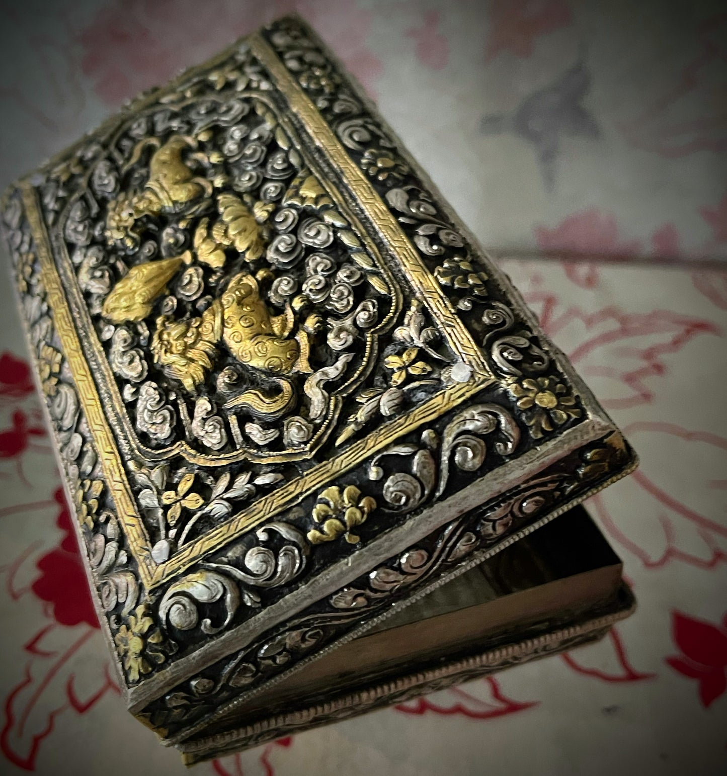 An antique carved Silver and gilded silver Bhutanese betel nut box