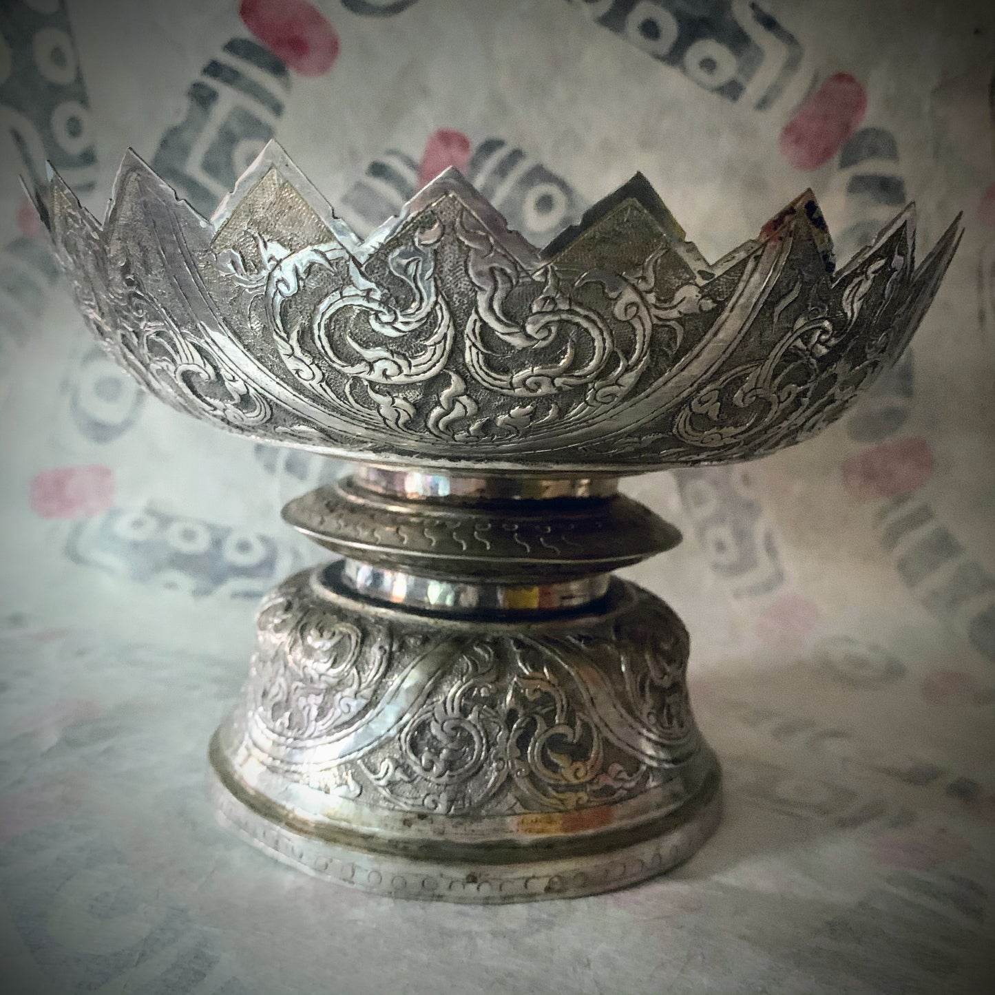 An antique silver fruit bowl stand