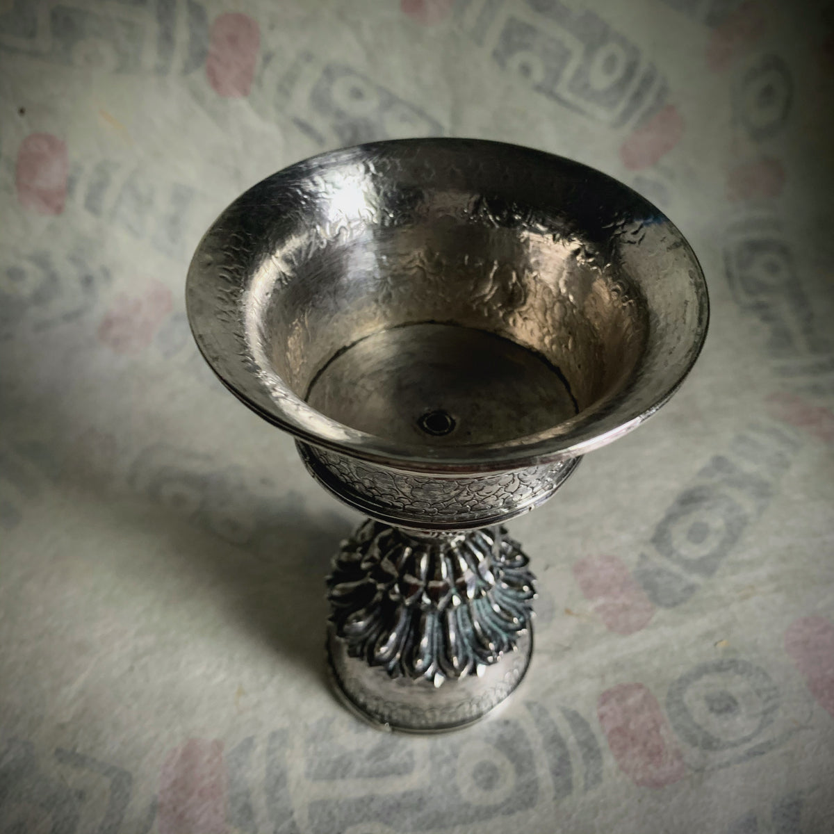 A silver Tibetan butterlamp