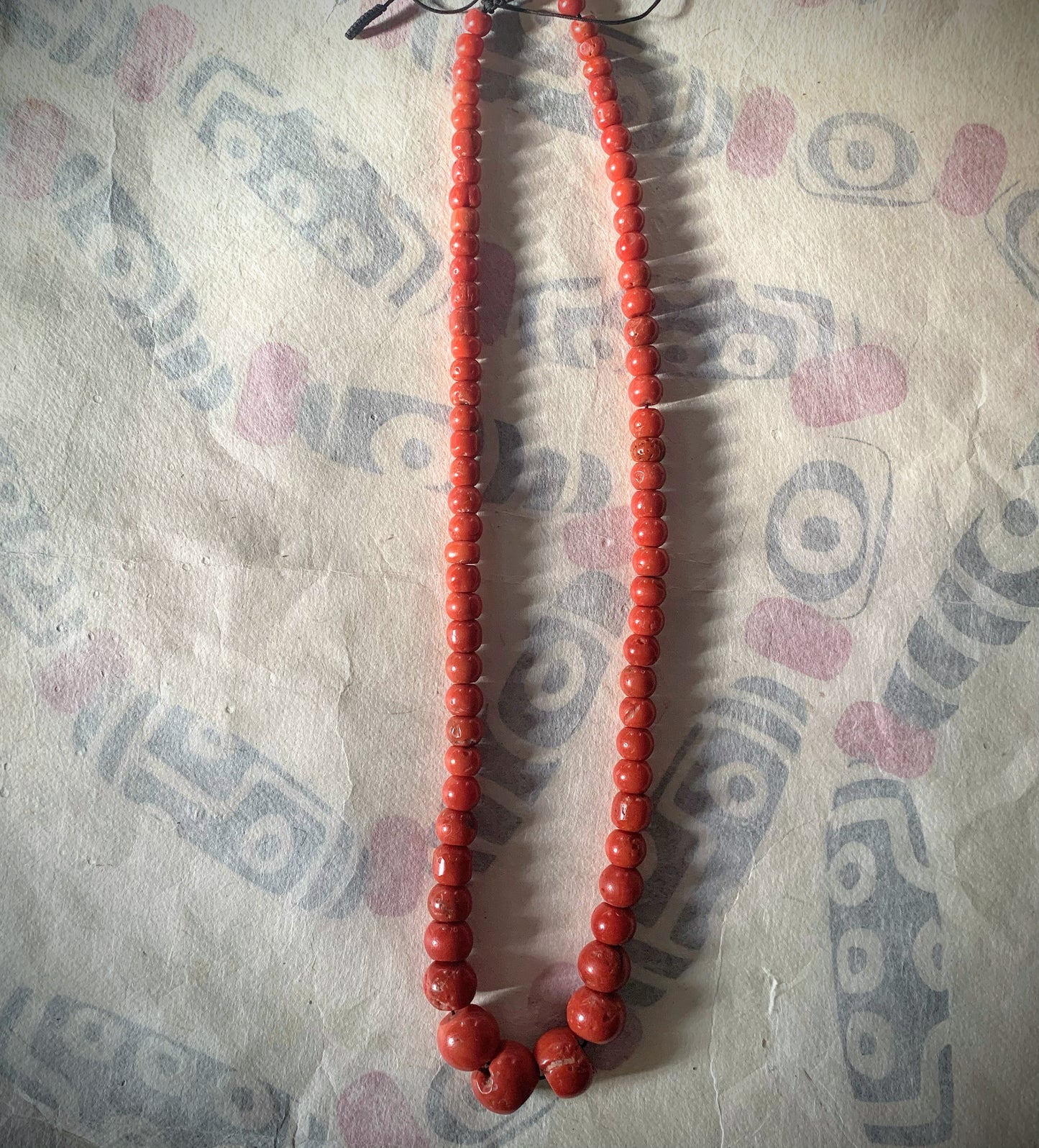 A necklace with antique coral beads