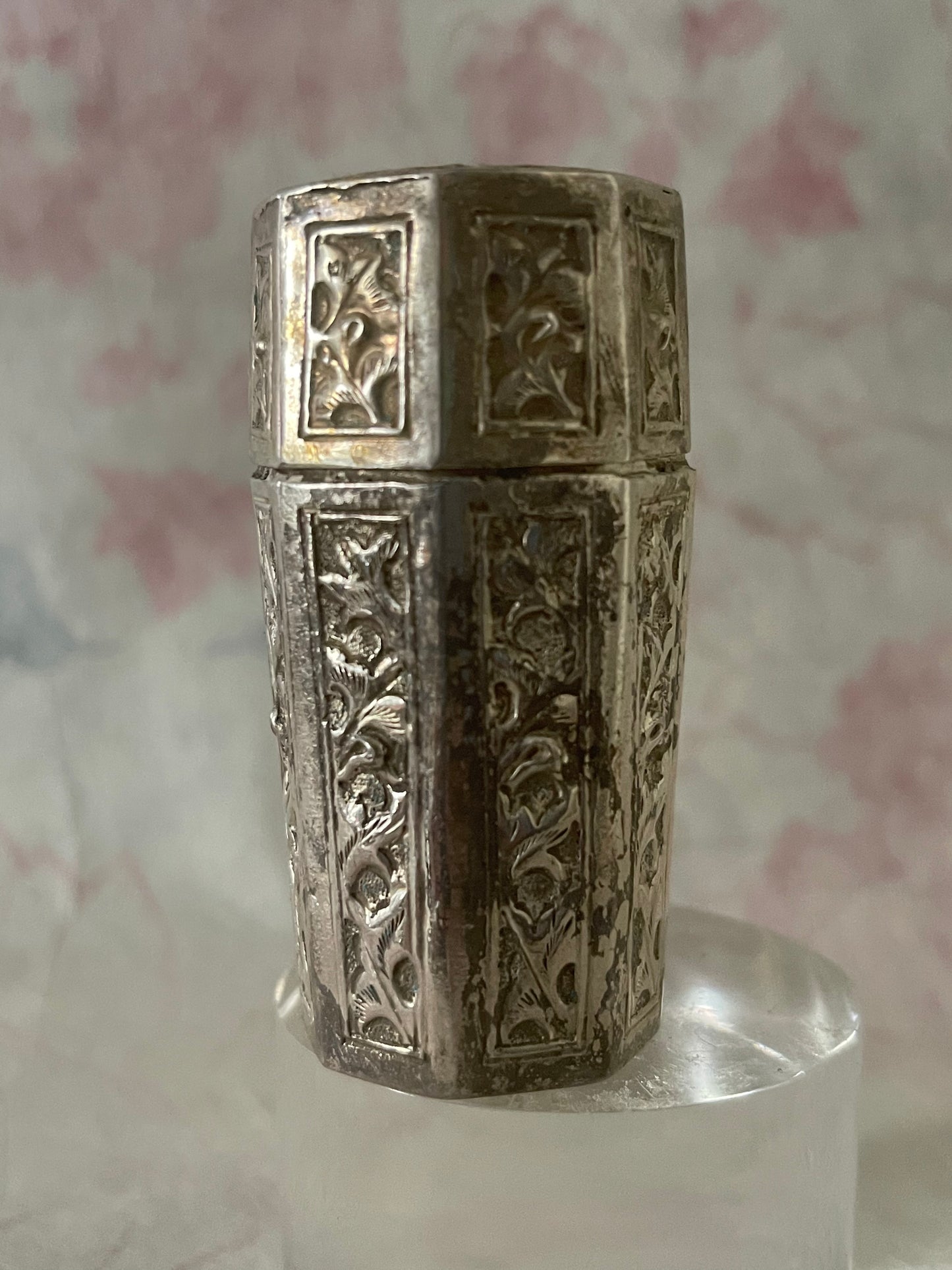 An antique octagonal shaped silver box with lid from south east Asia.