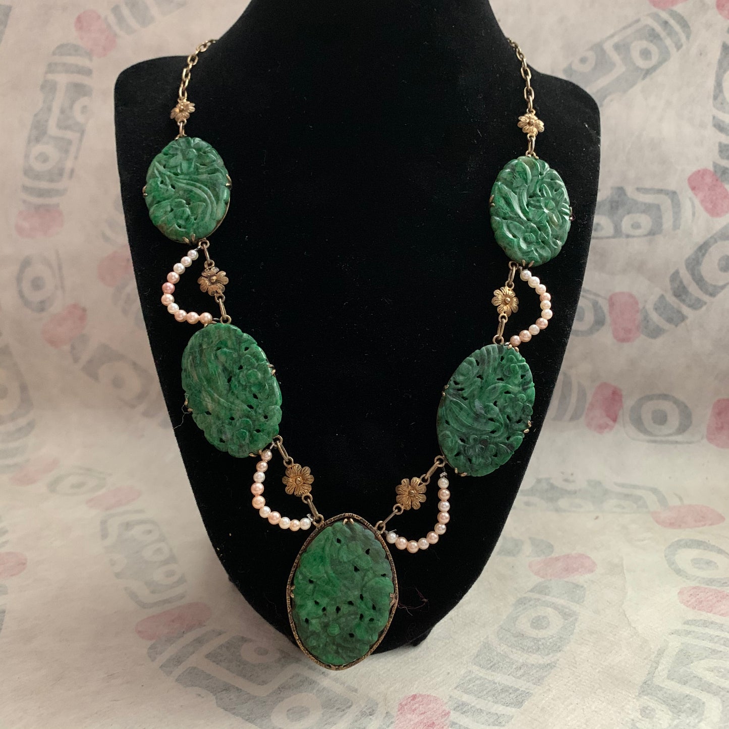A spinach green jade necklace