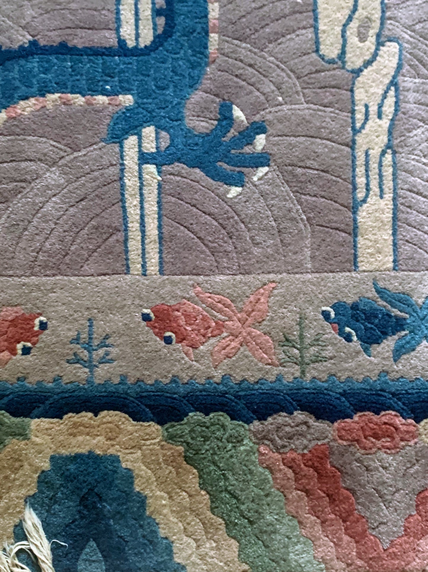 An antique Chinese dragon rug