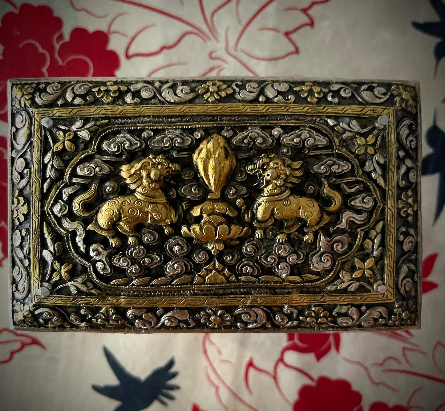 An antique carved Silver and gilded silver Bhutanese betel nut box