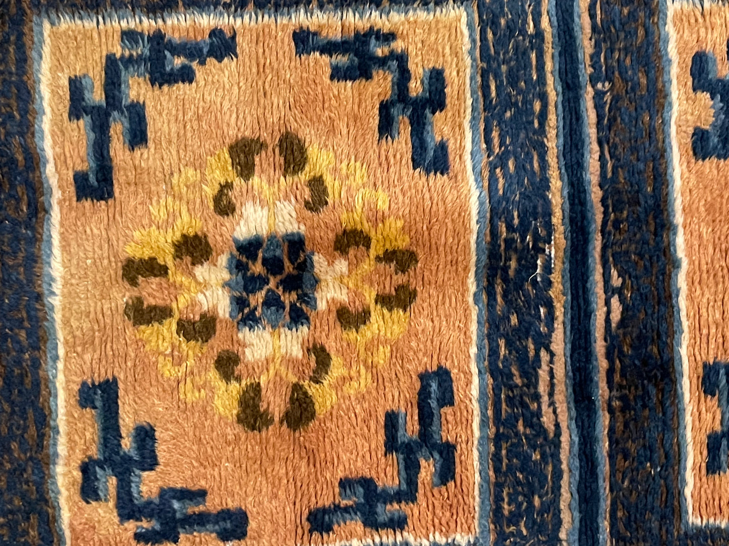 An antique triple seater Tibetan meditation rug