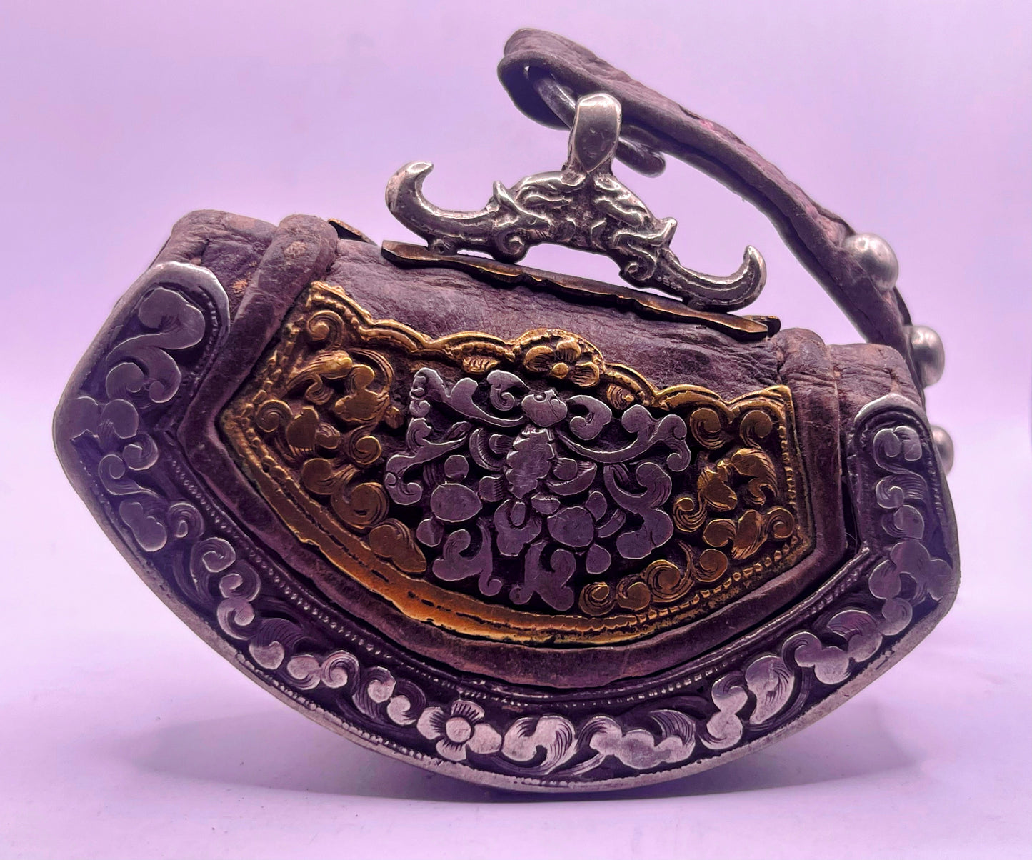 An antique Tibetan mechak purse with turquoise