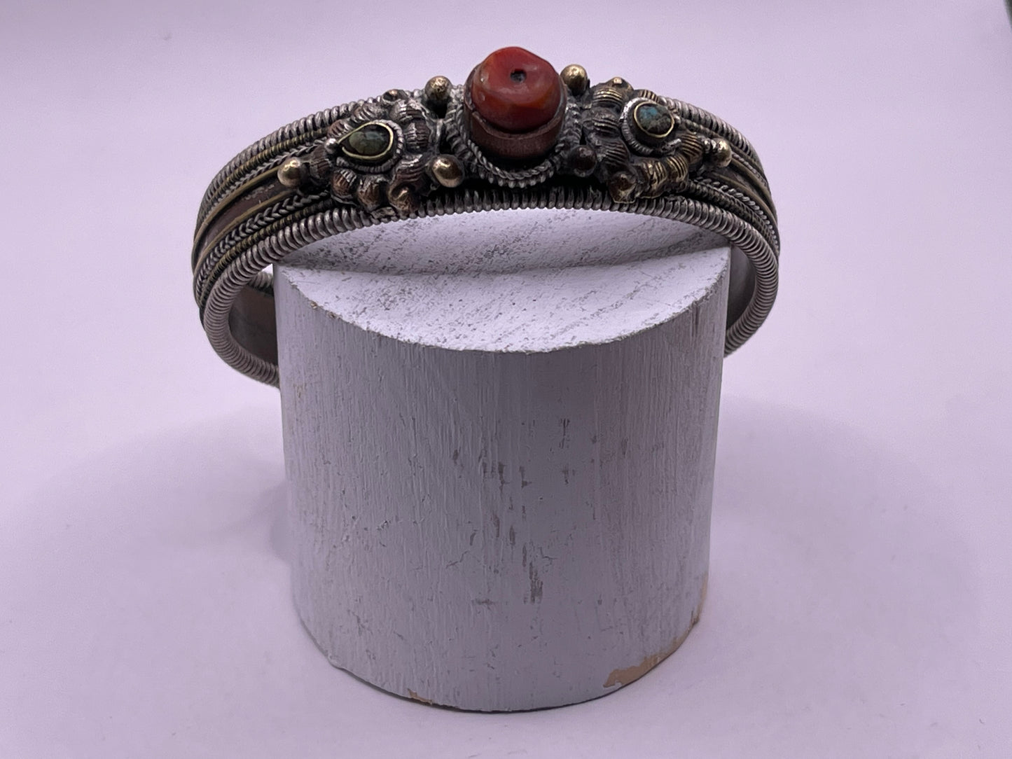 Antique Tibetan silver and coral bangle