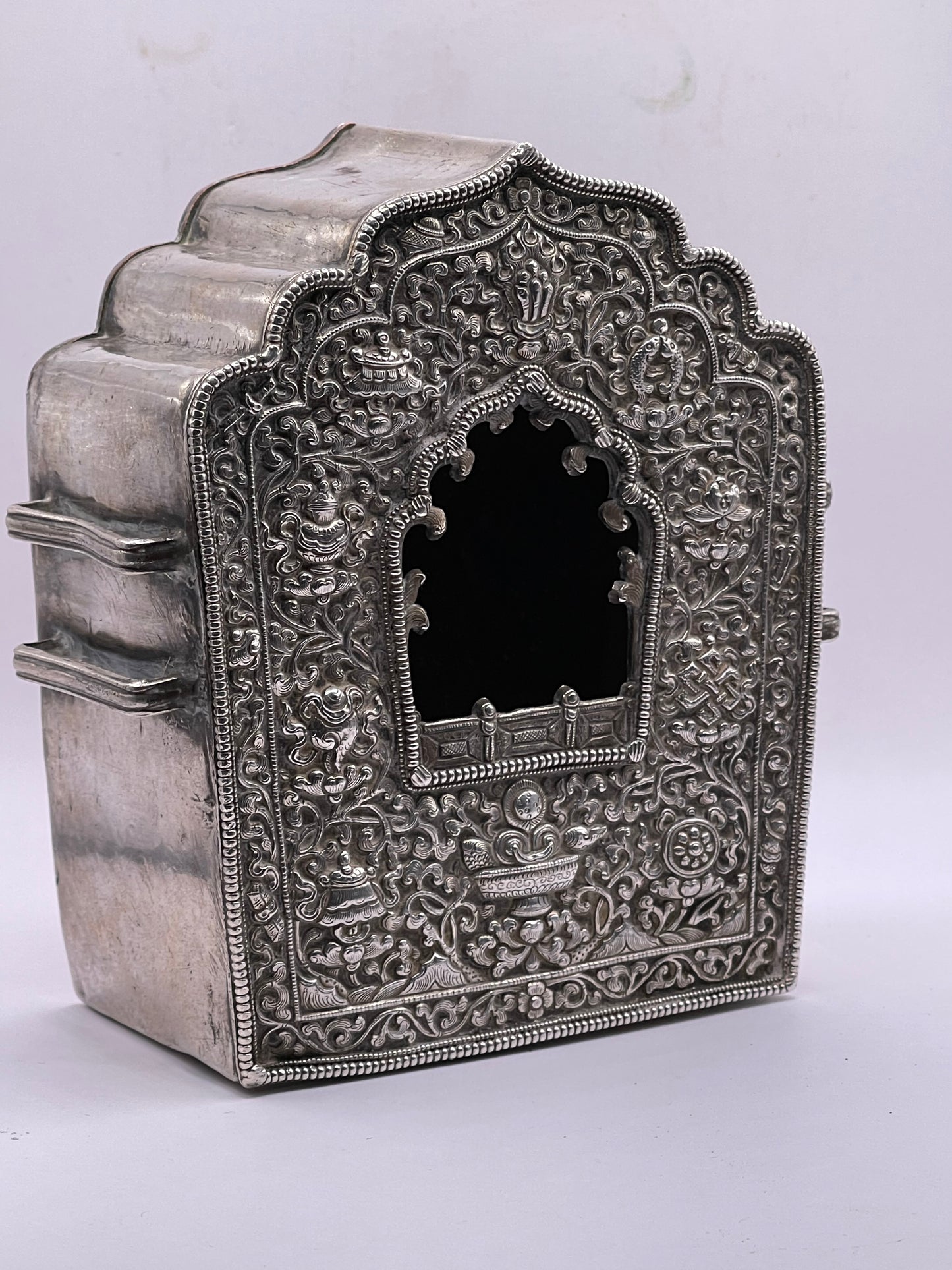 An antique 19th C., silver Tibetan ghau