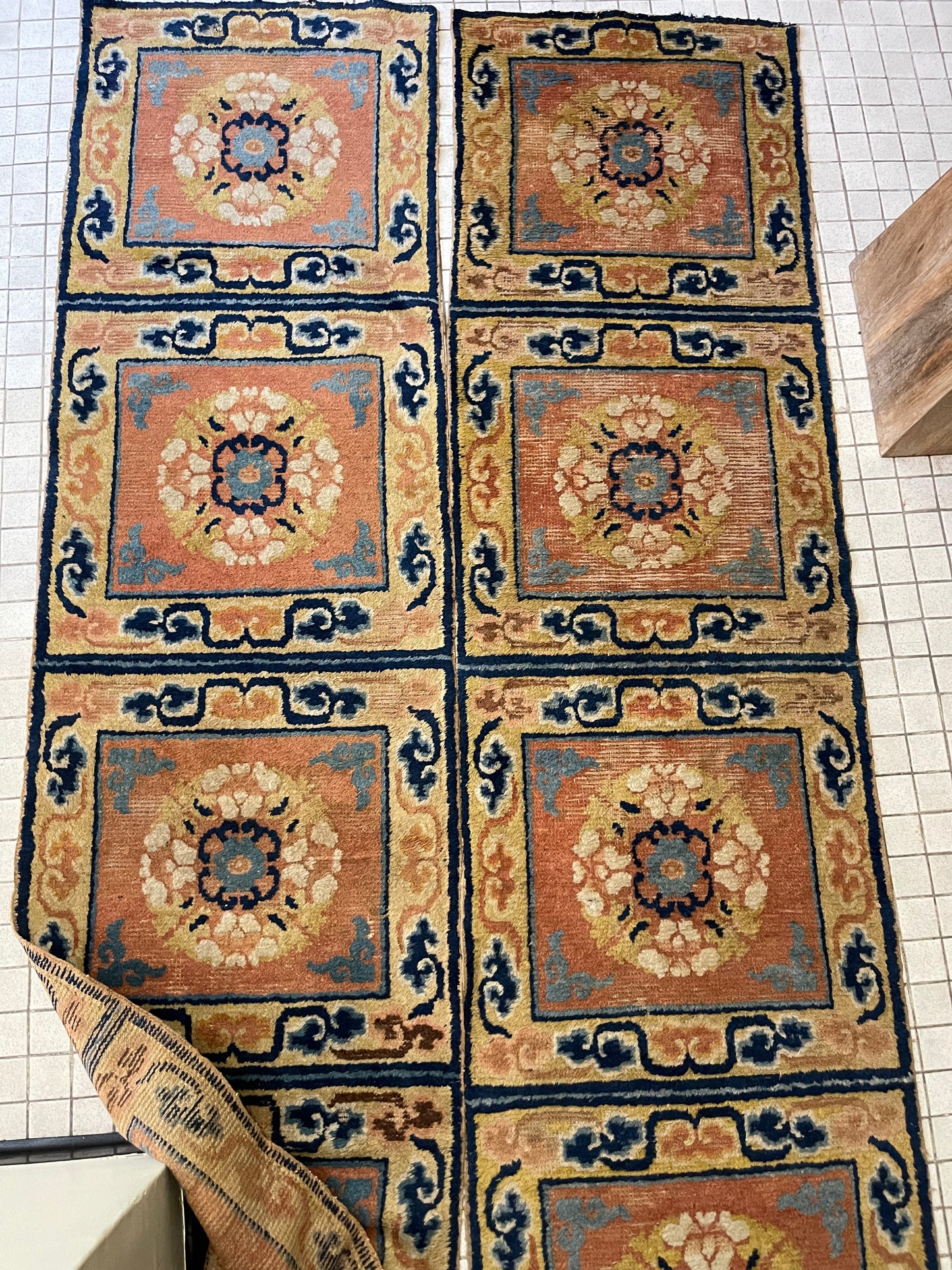 A pair of antique monastery runner carpets