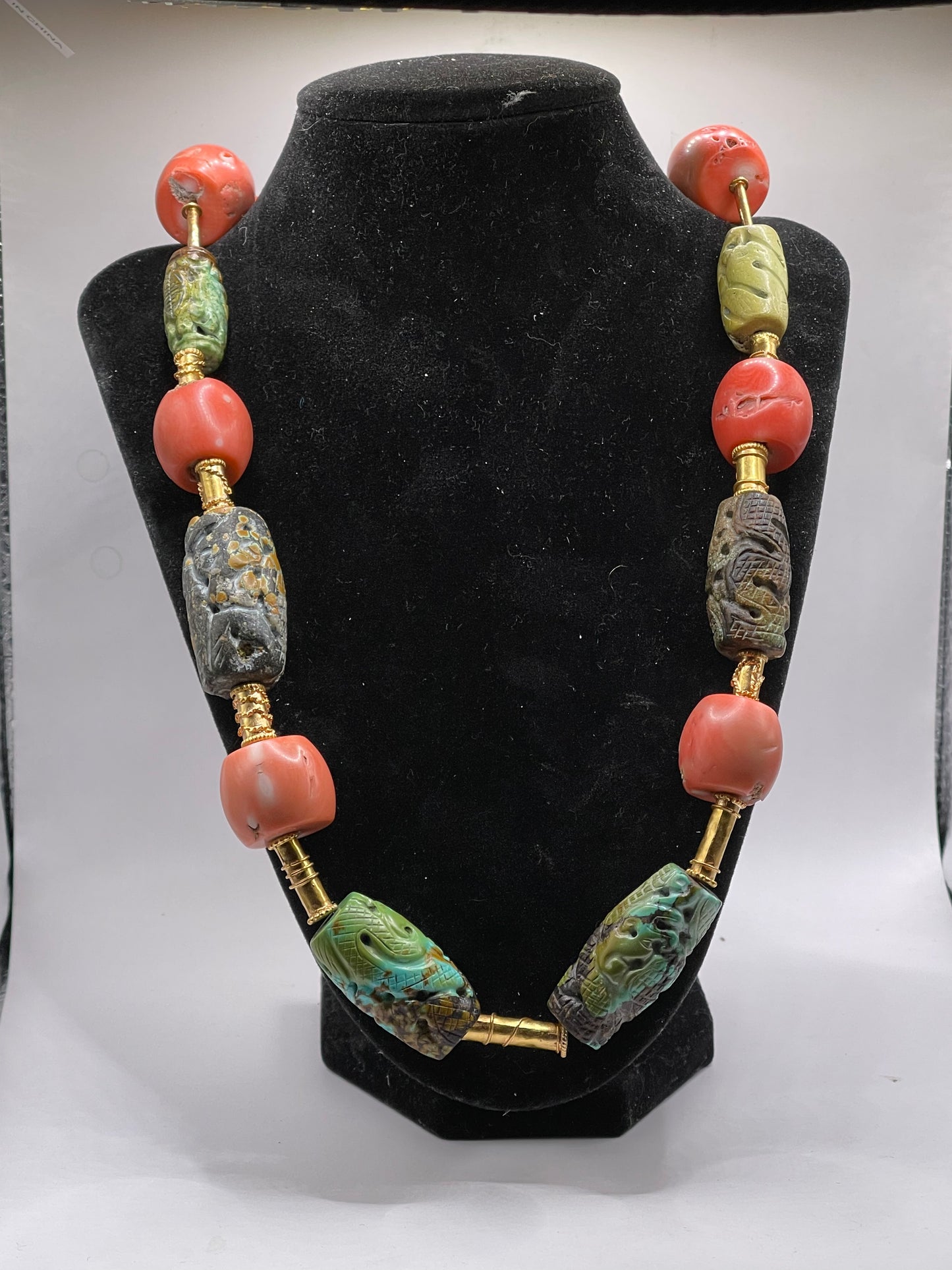 A necklace with vintage carved beads