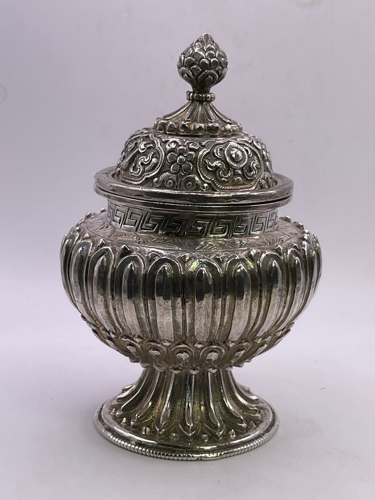 A vintage silver pot - bumpa