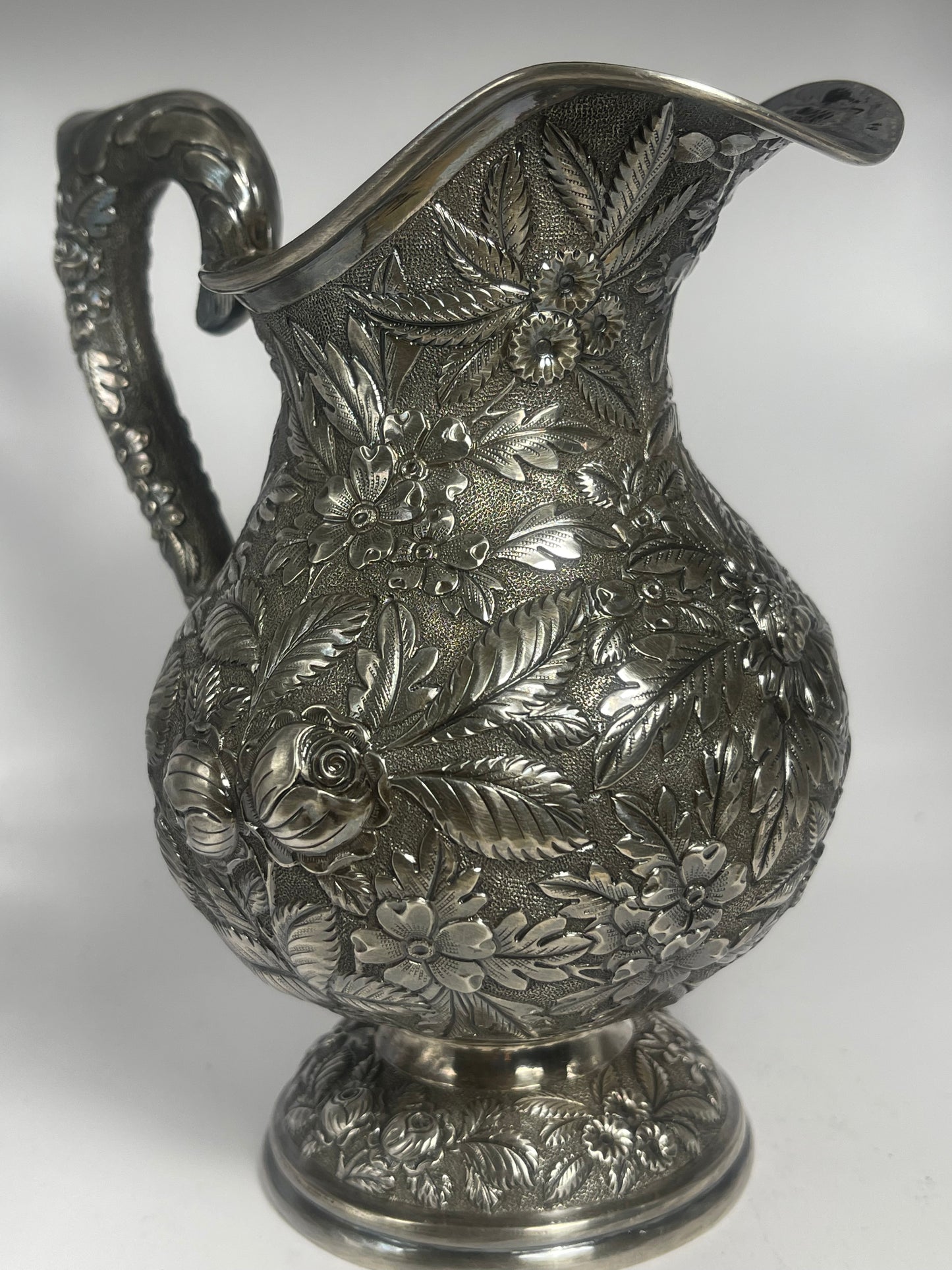 Early 20th C., antique hand chased pitcher
