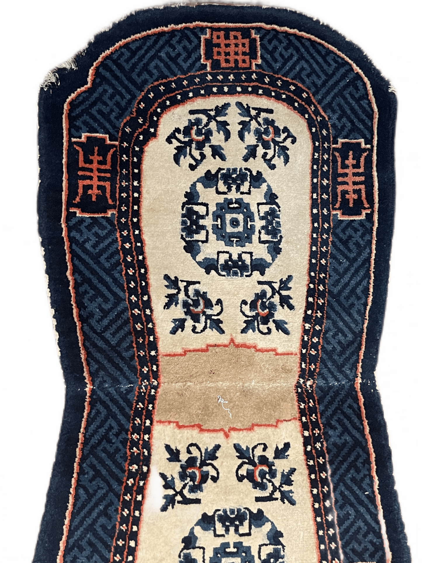 A vintage Tibetan indigo rounded woolen saddle rug