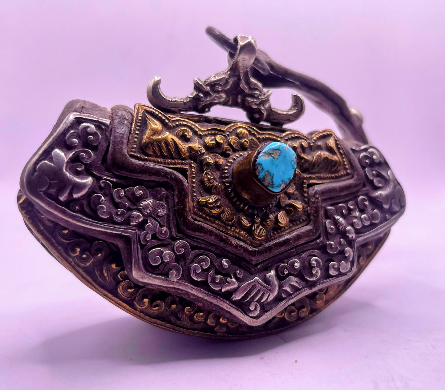 An antique Tibetan mechak purse with turquoise