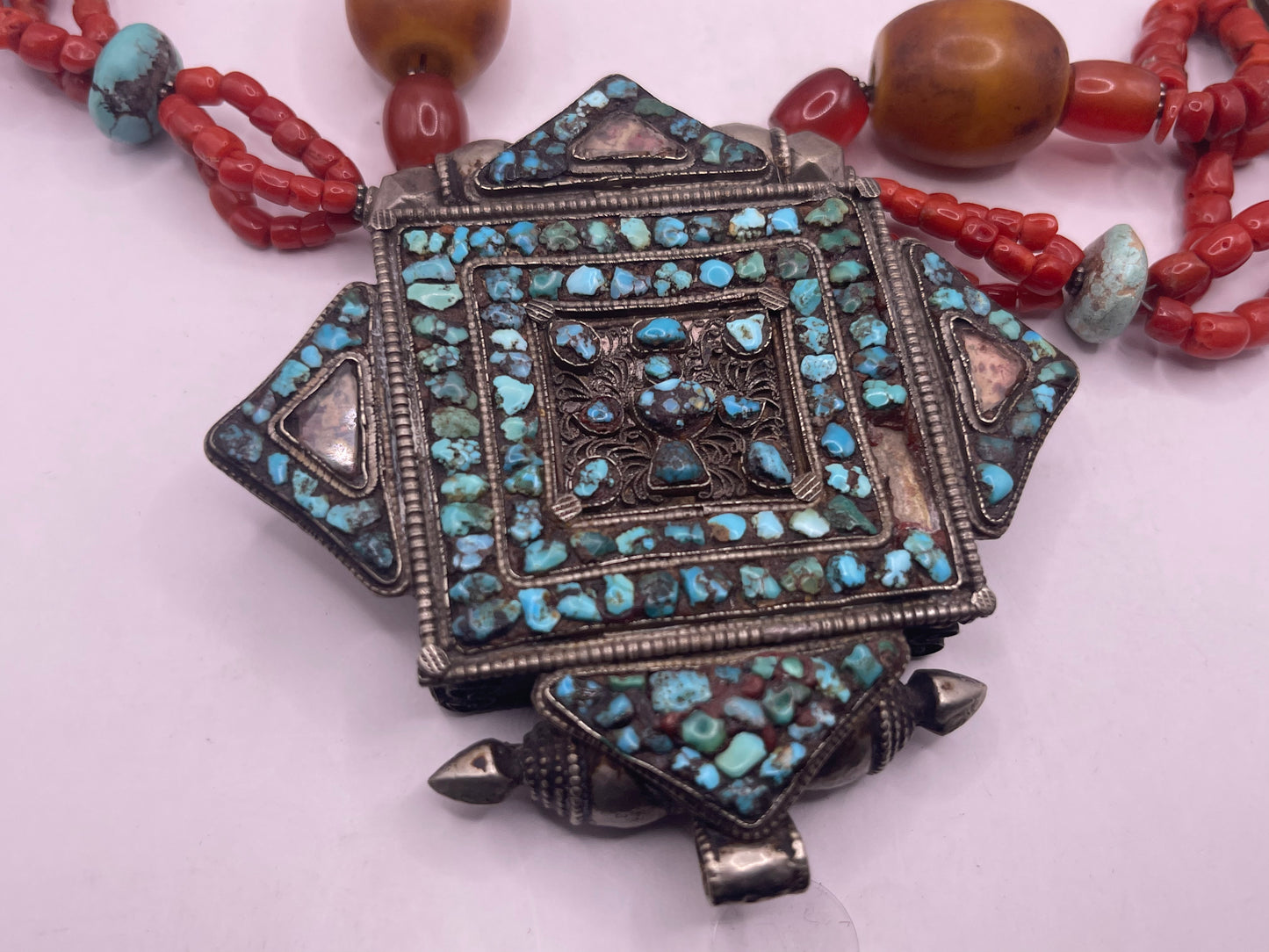 Antique ghau with coral and silver bead necklace