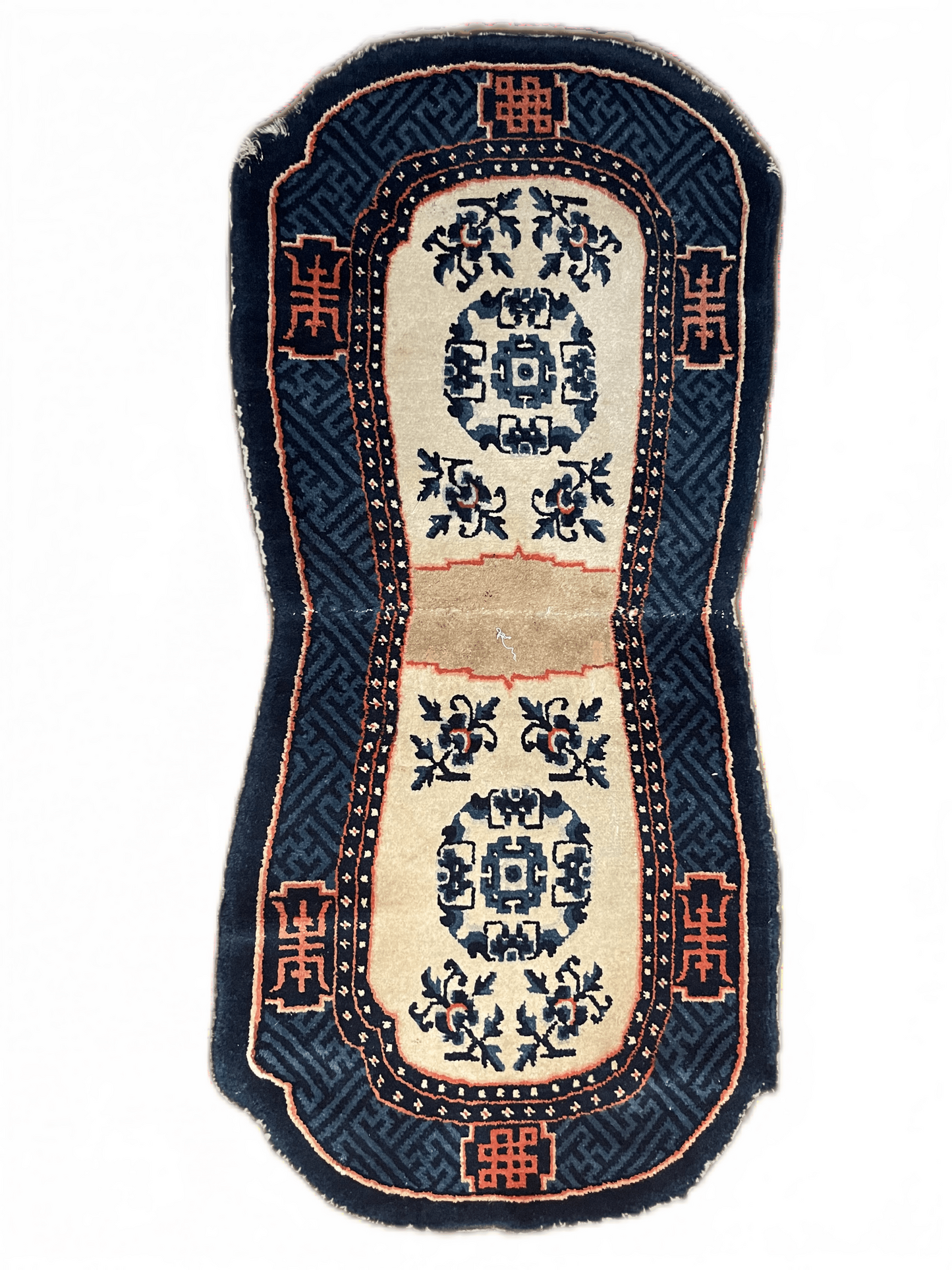 A vintage Tibetan indigo rounded woolen saddle rug