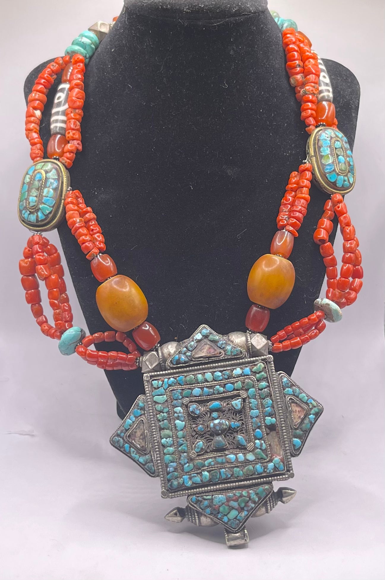 Antique ghau with coral and silver bead necklace