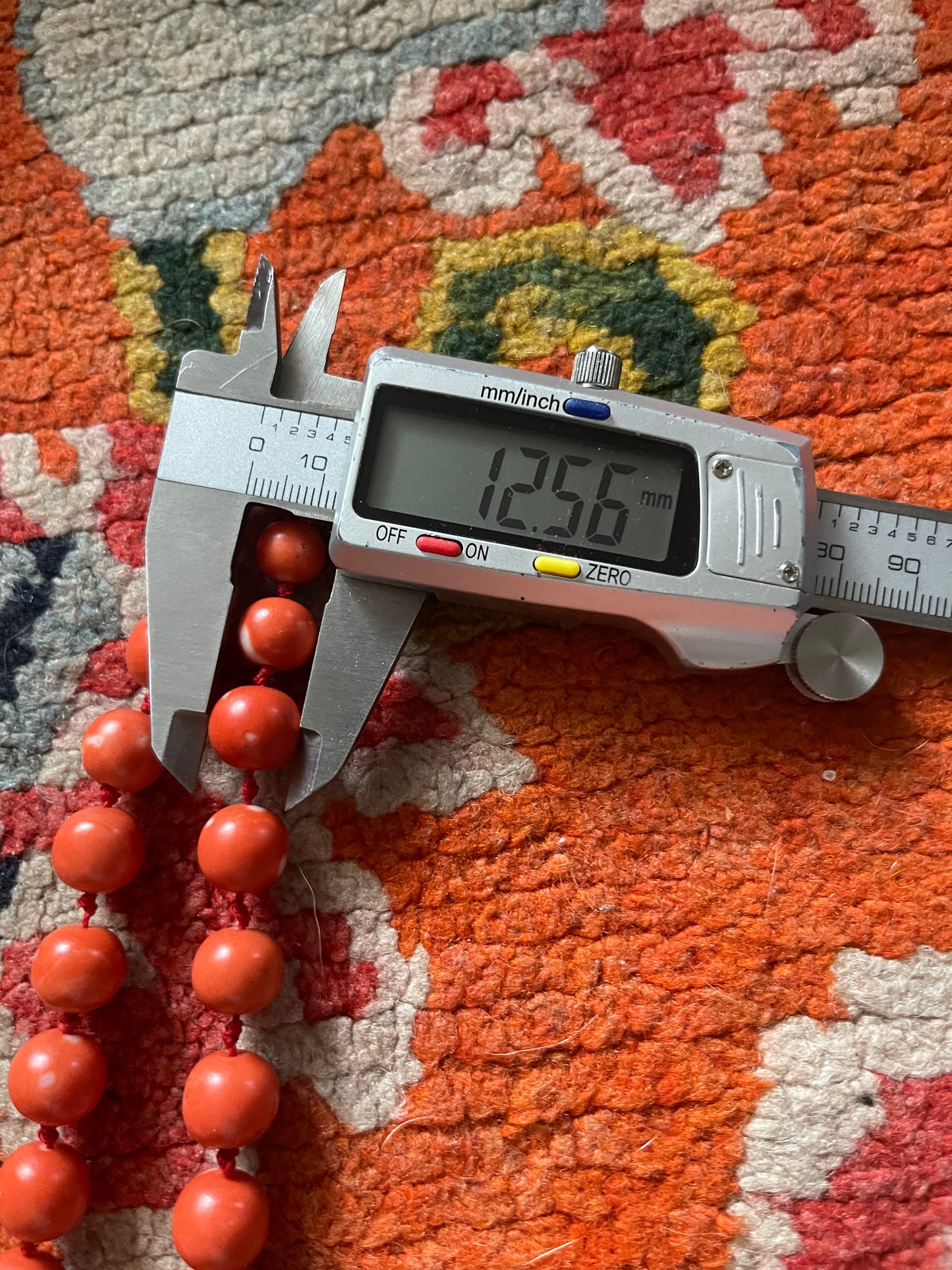 A necklace with vintage momo coral beads