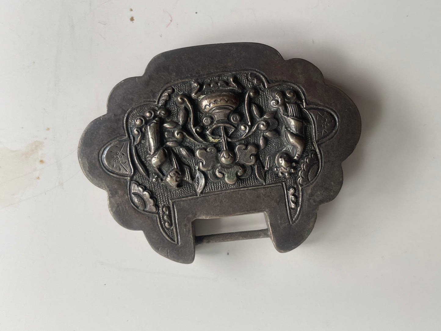An antique Mongolian silver spirit lock