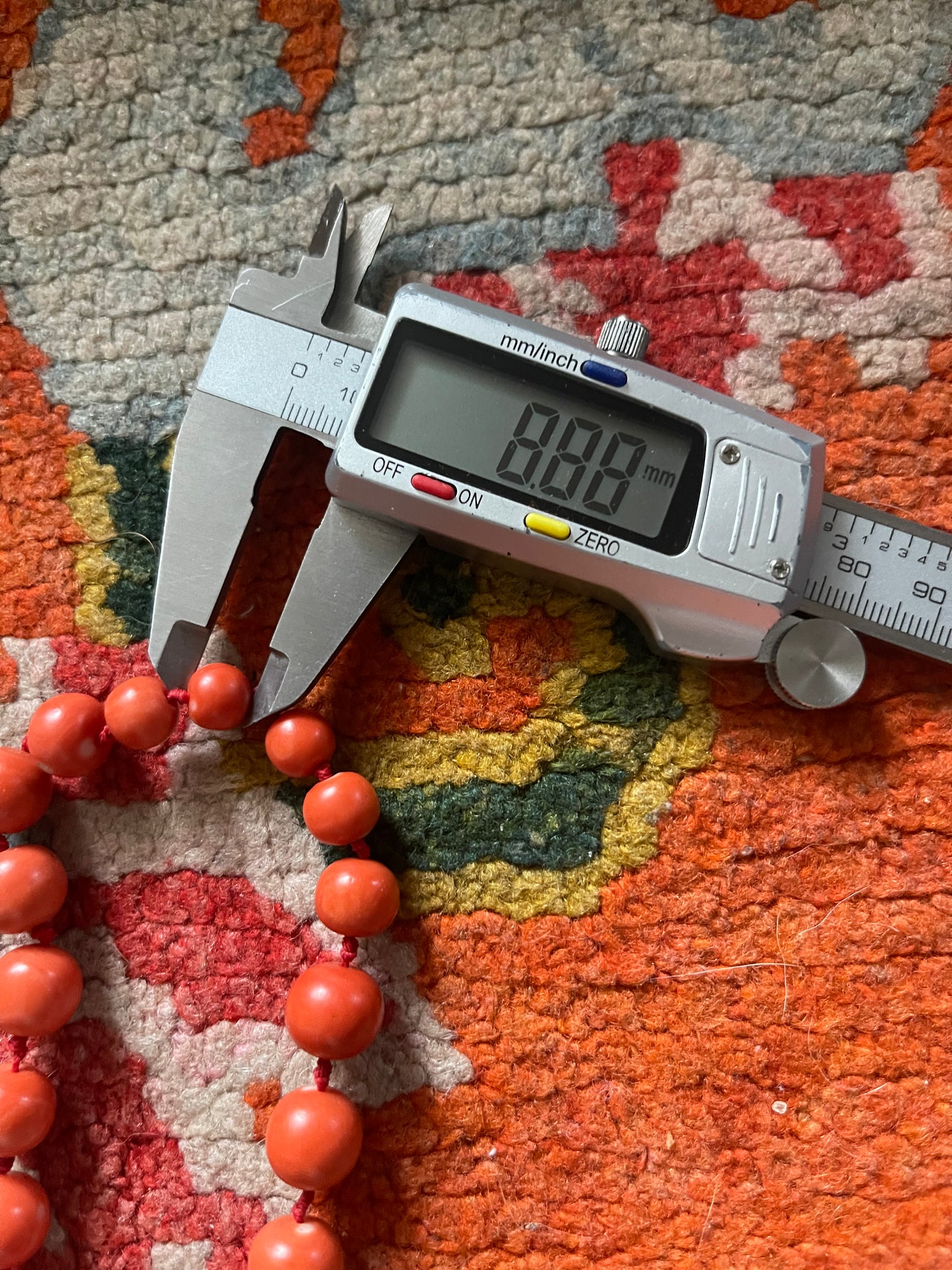 A necklace with vintage momo coral beads