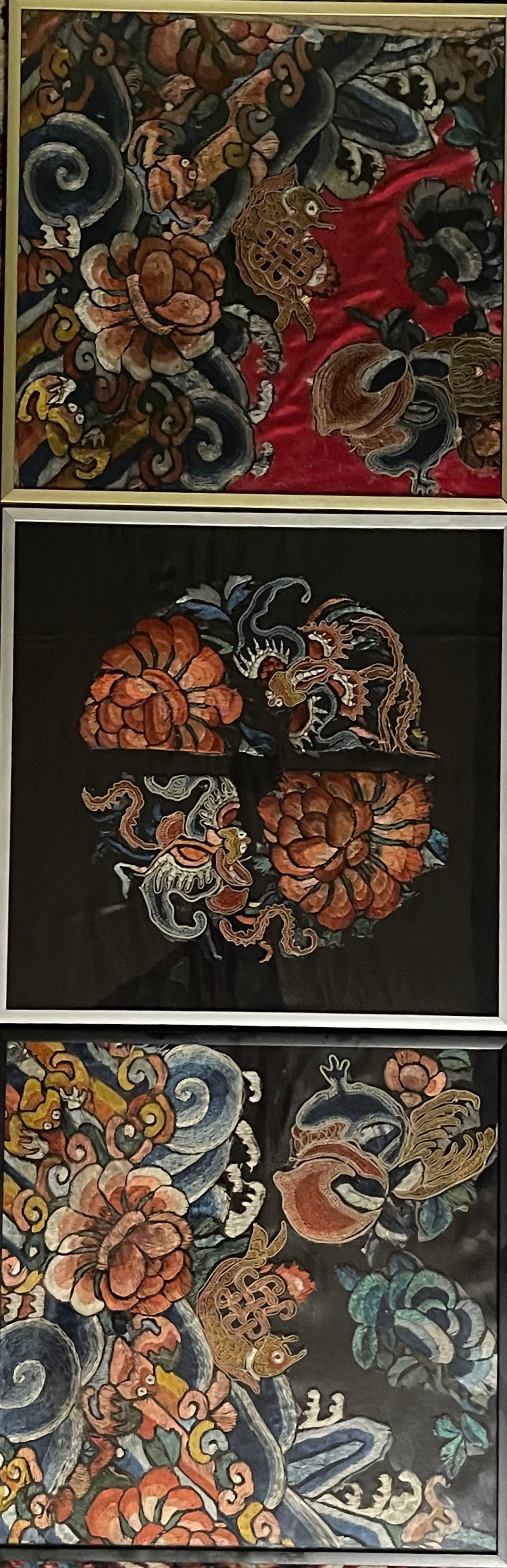 An antique framed Chinese embroidered textile fragment