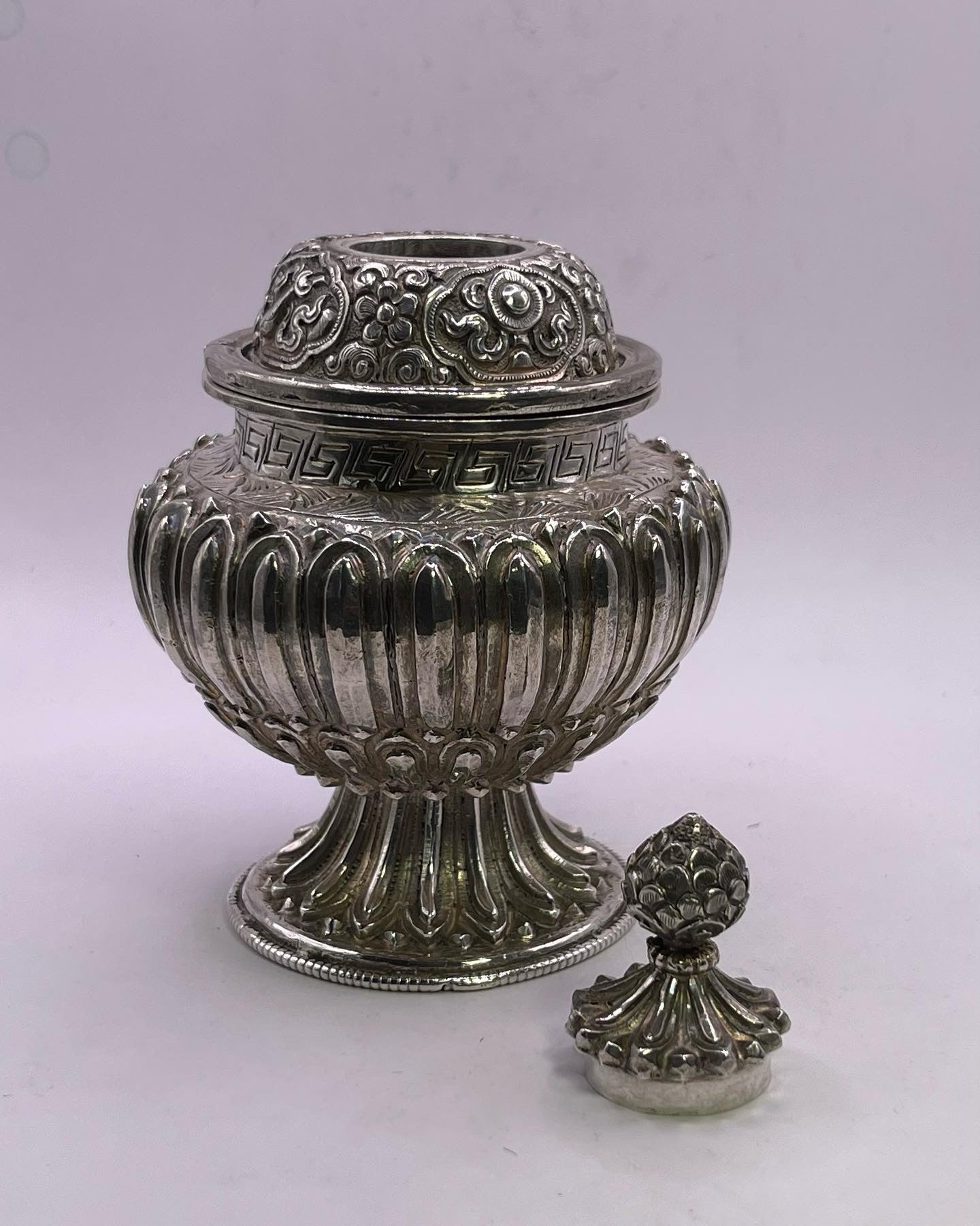 A vintage silver pot - bumpa