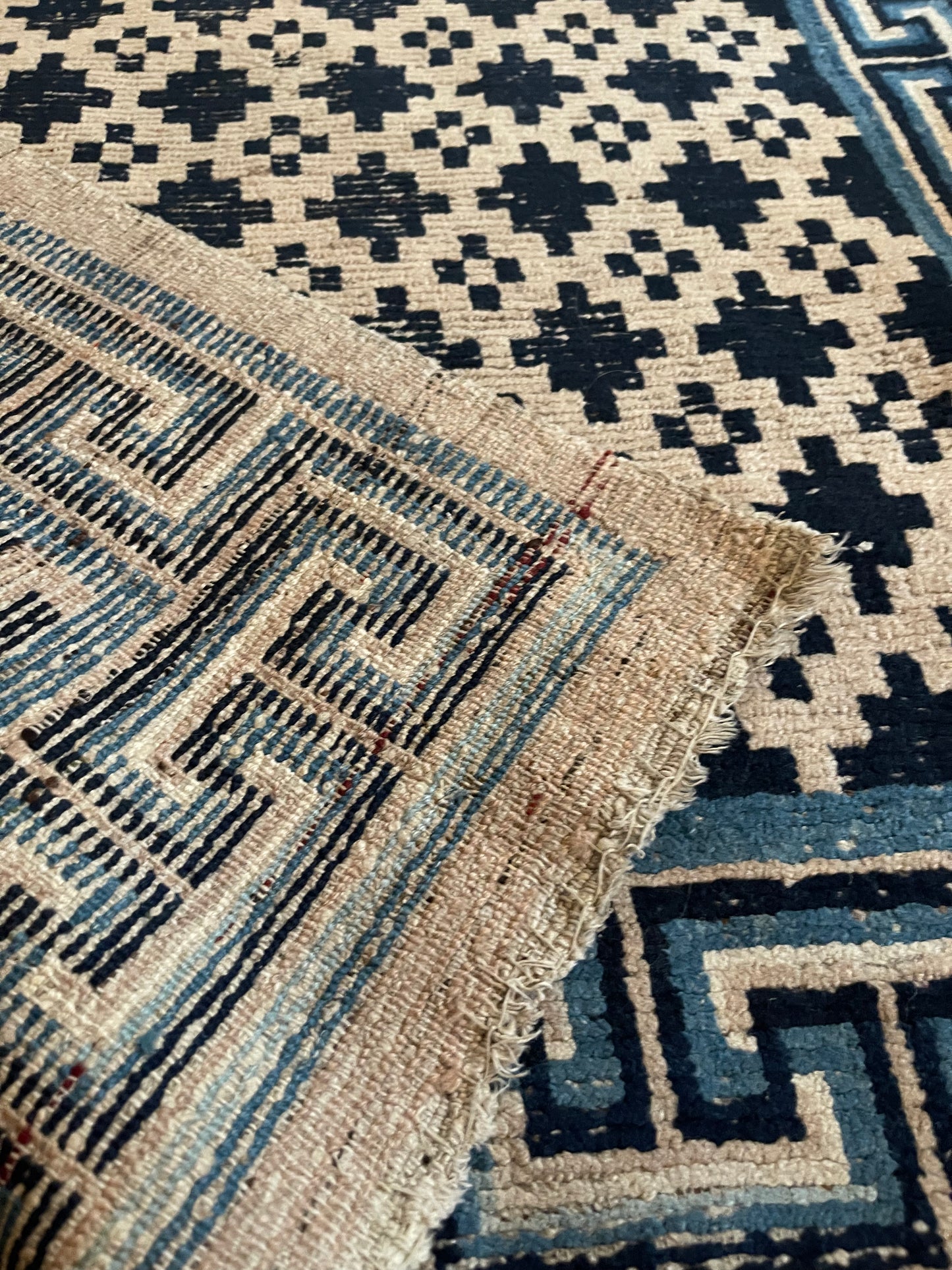 Antique Tibetan wool geometrical vegetable dyed rug