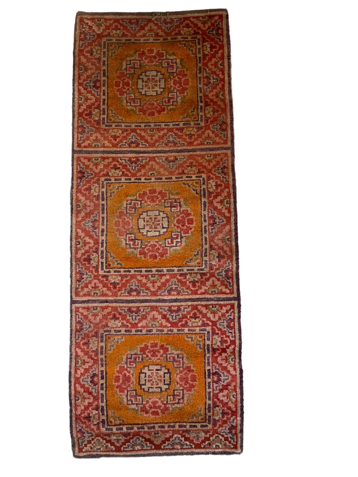 An antique triple seater Tibetan meditation rug
