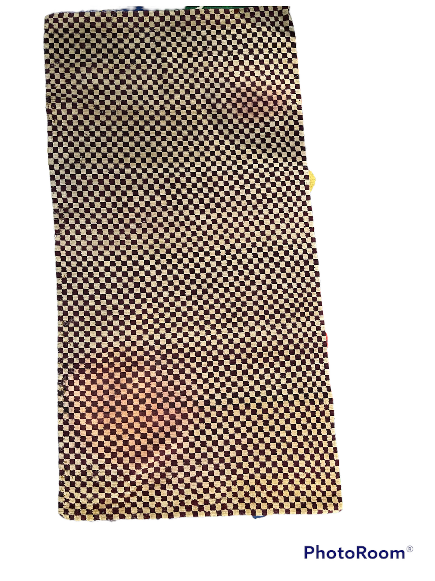 An antique Tibetan checkerboard handmade wool rug