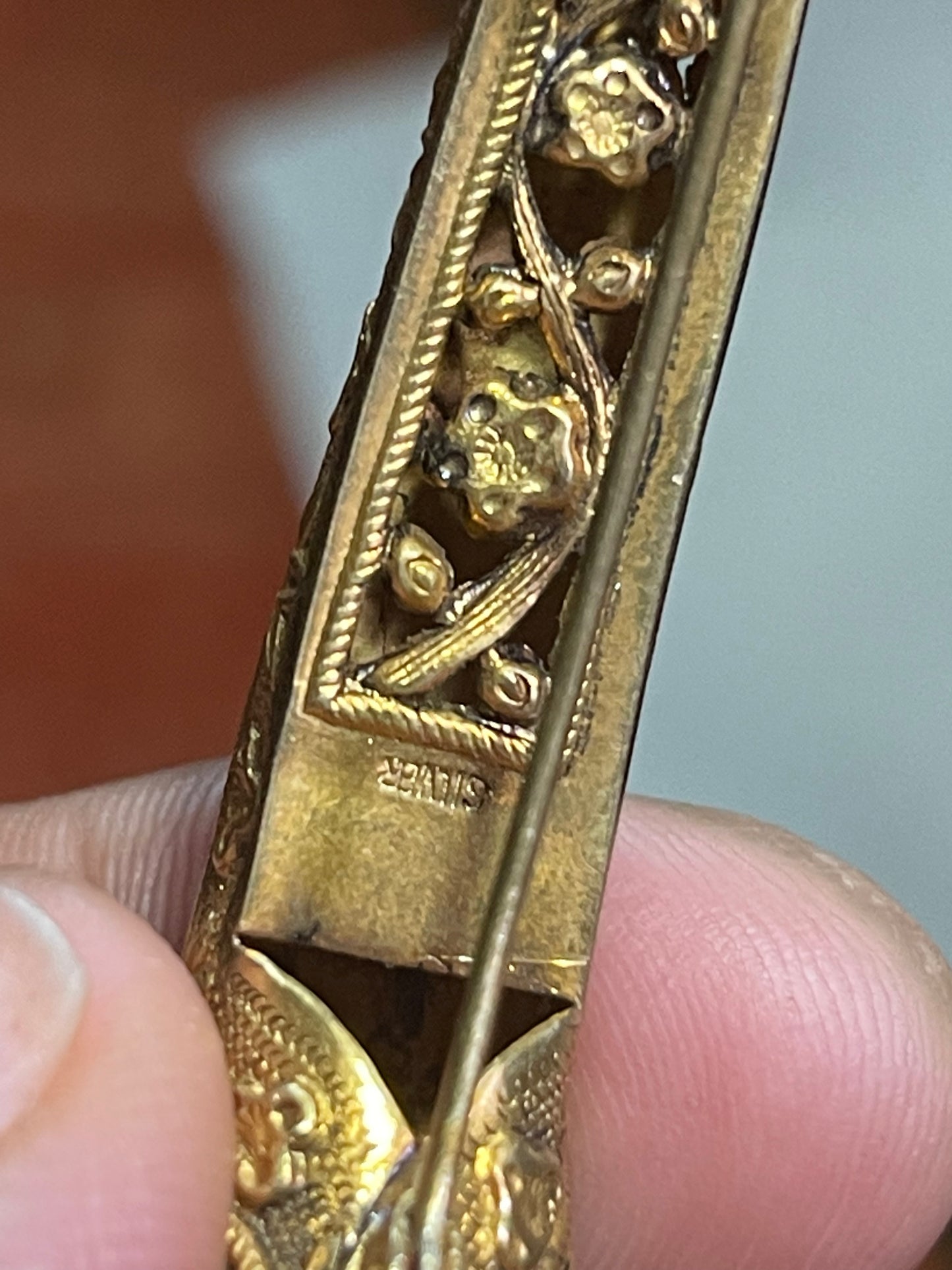 A set of three vintage gilded silver nail covers