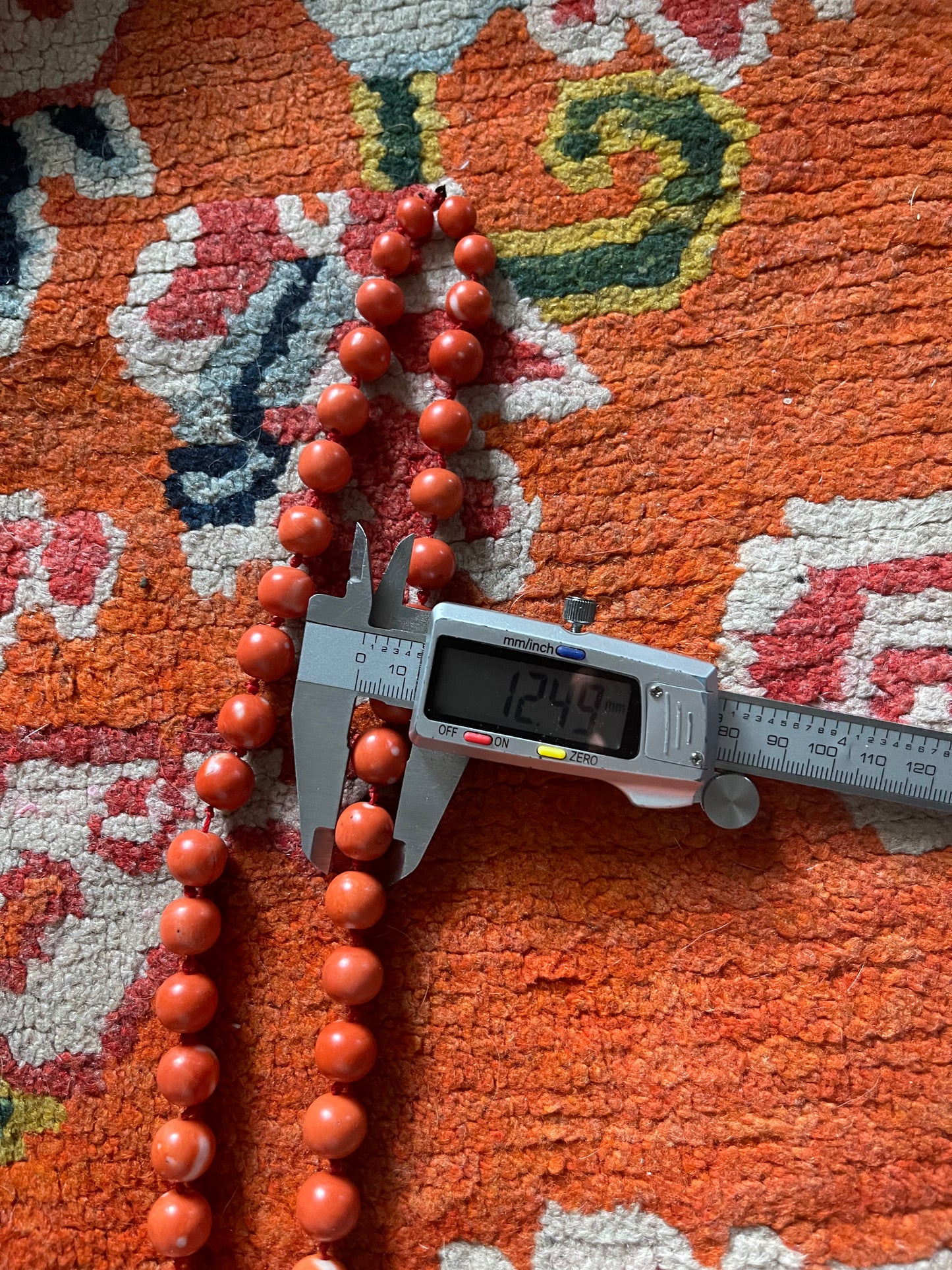 A necklace with vintage momo coral beads