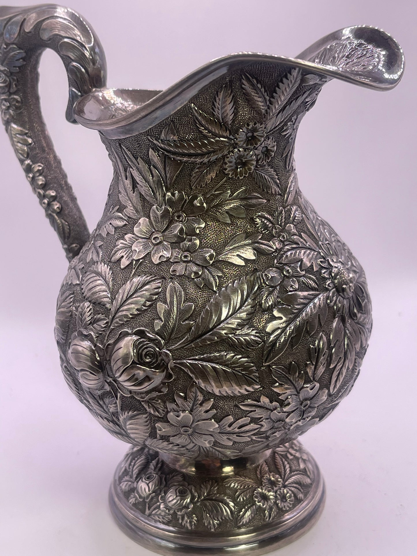 Early 20th C., antique hand chased pitcher