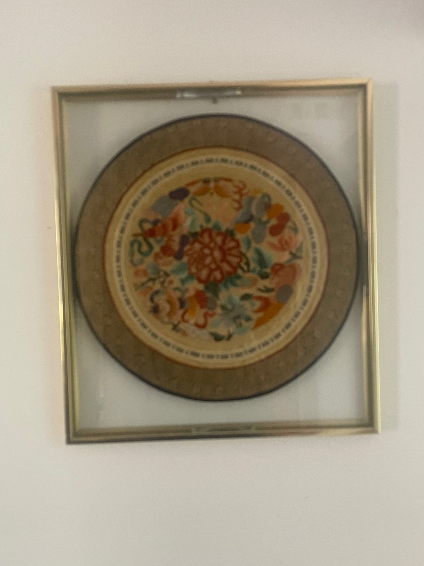 A framed embroidered 19th Century rank badge