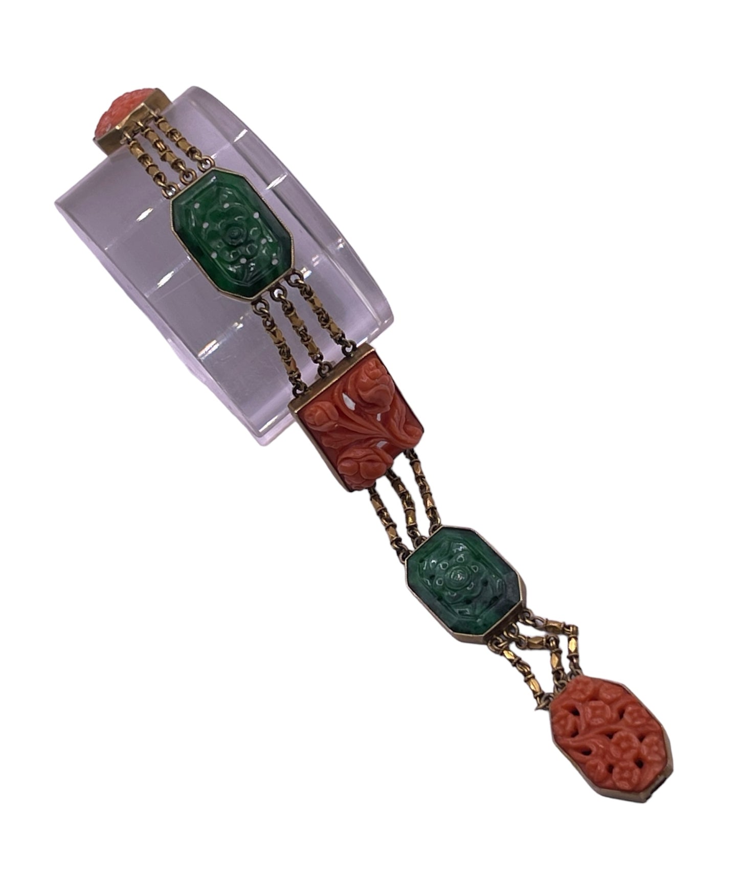 A jade and coral plaque in 14kt bracelet