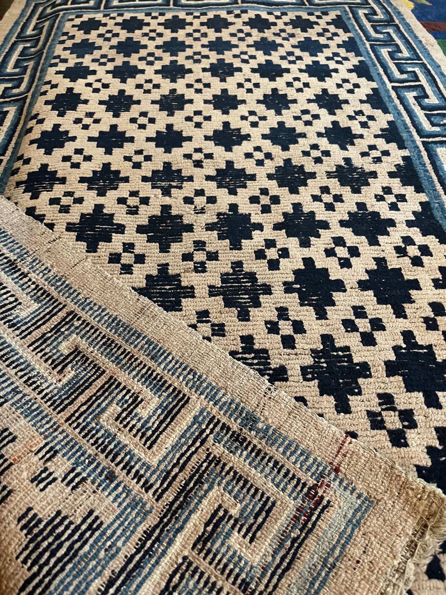 Antique Tibetan wool geometrical vegetable dyed rug