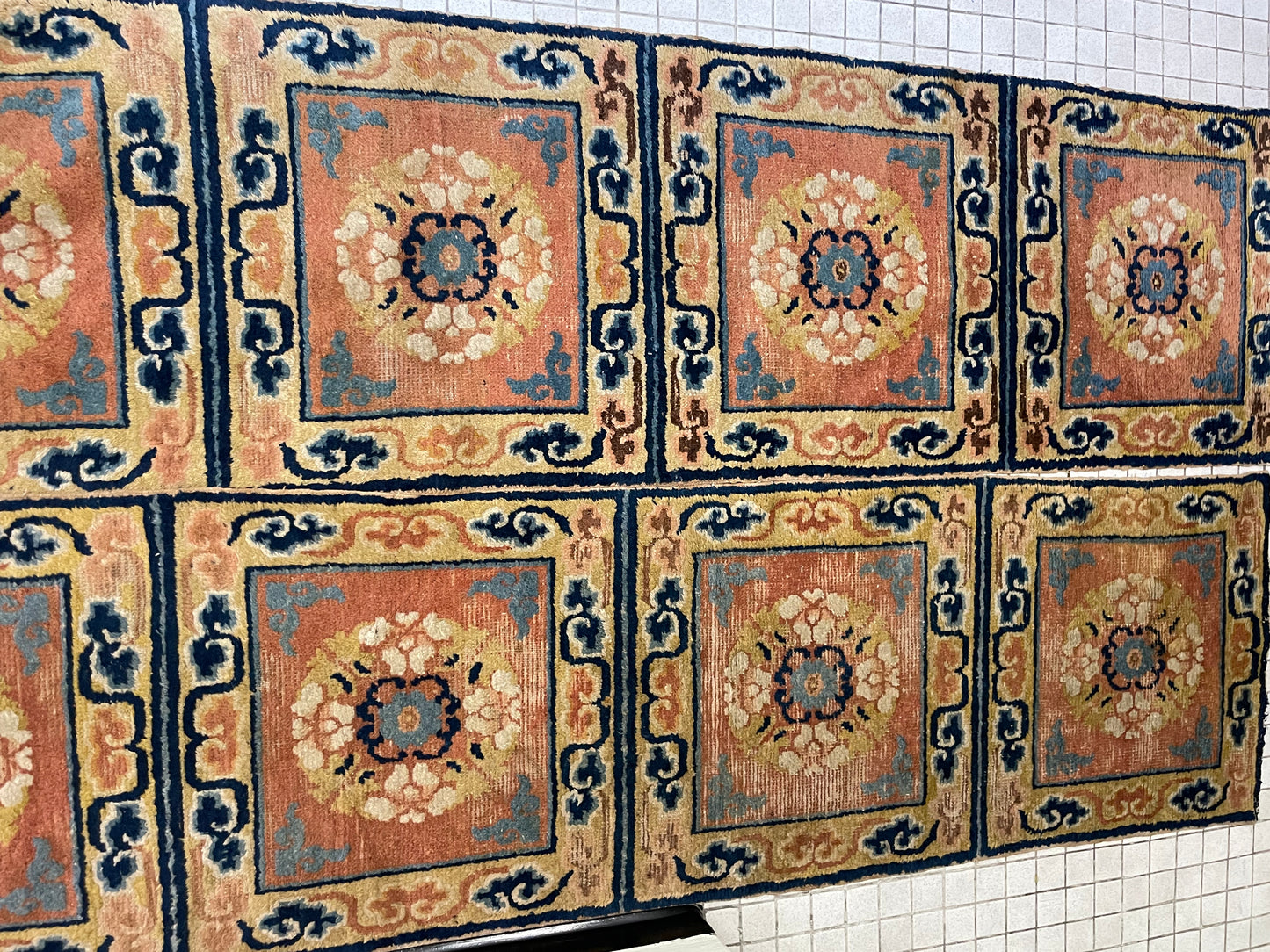 A pair of antique monastery runner carpets