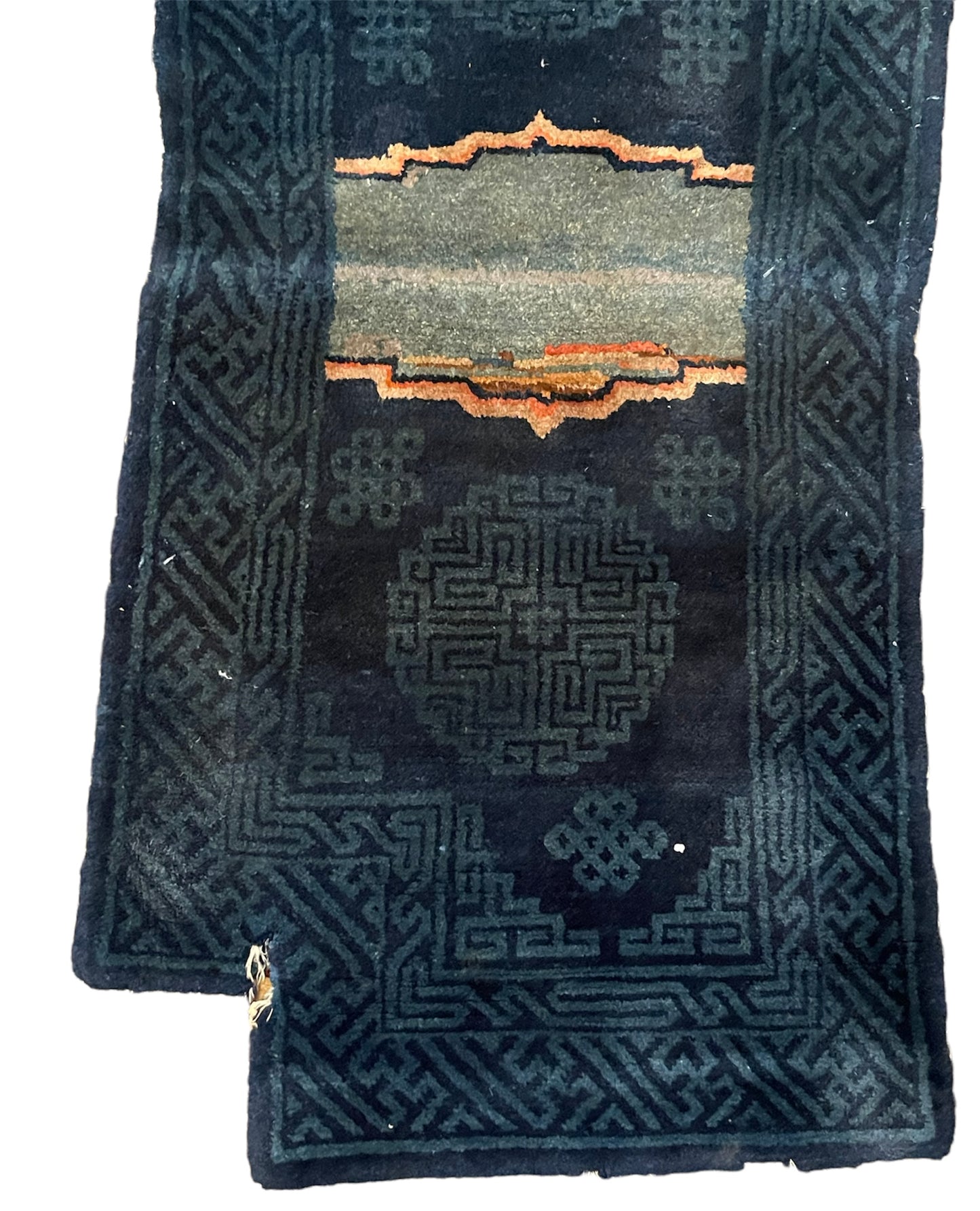 A vintage indigo Tibetan saddle rug