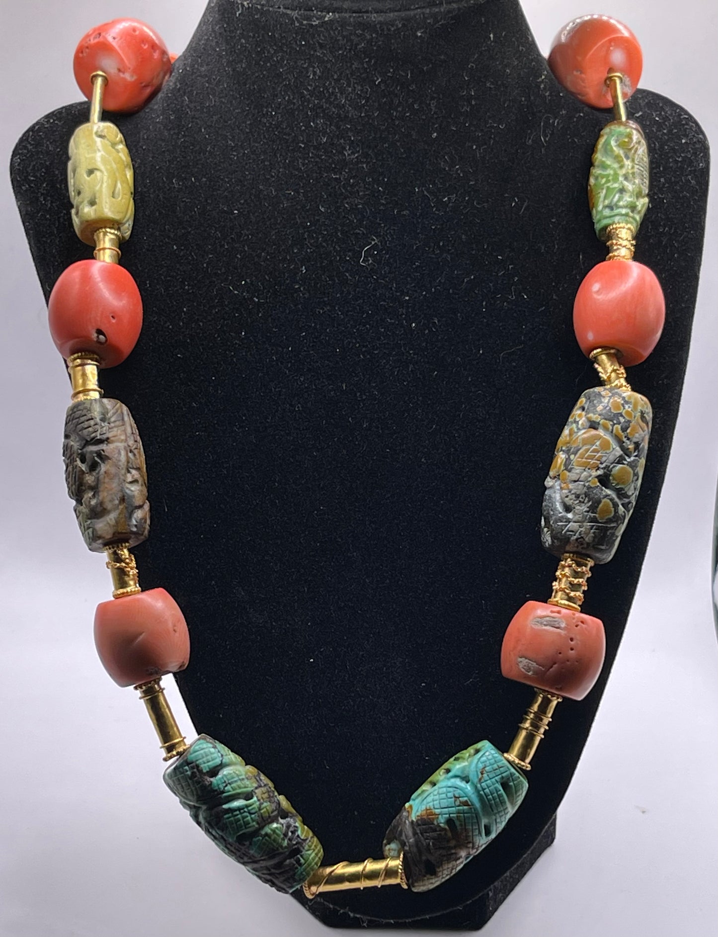 A necklace with vintage carved beads