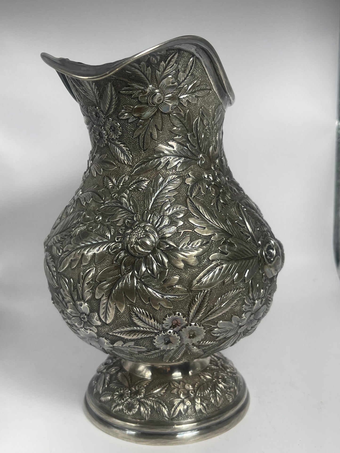 Early 20th C., antique hand chased pitcher