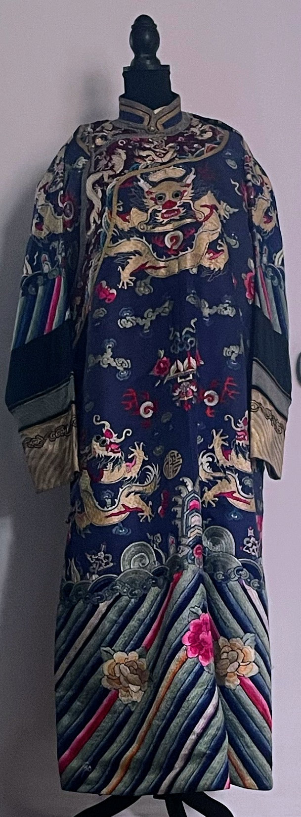 An antique blue silk embroidered dragon robe