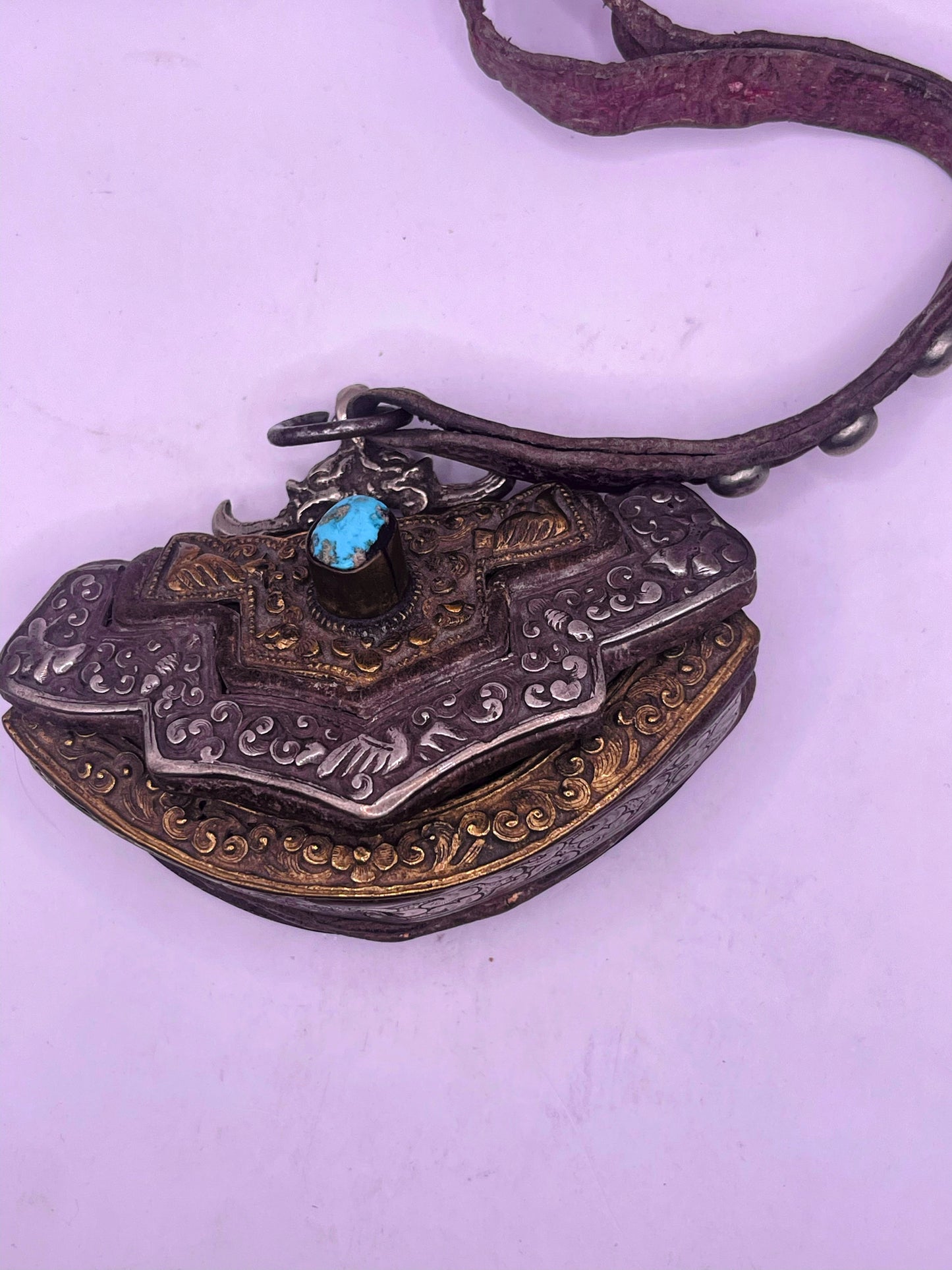 An antique Tibetan mechak purse with turquoise