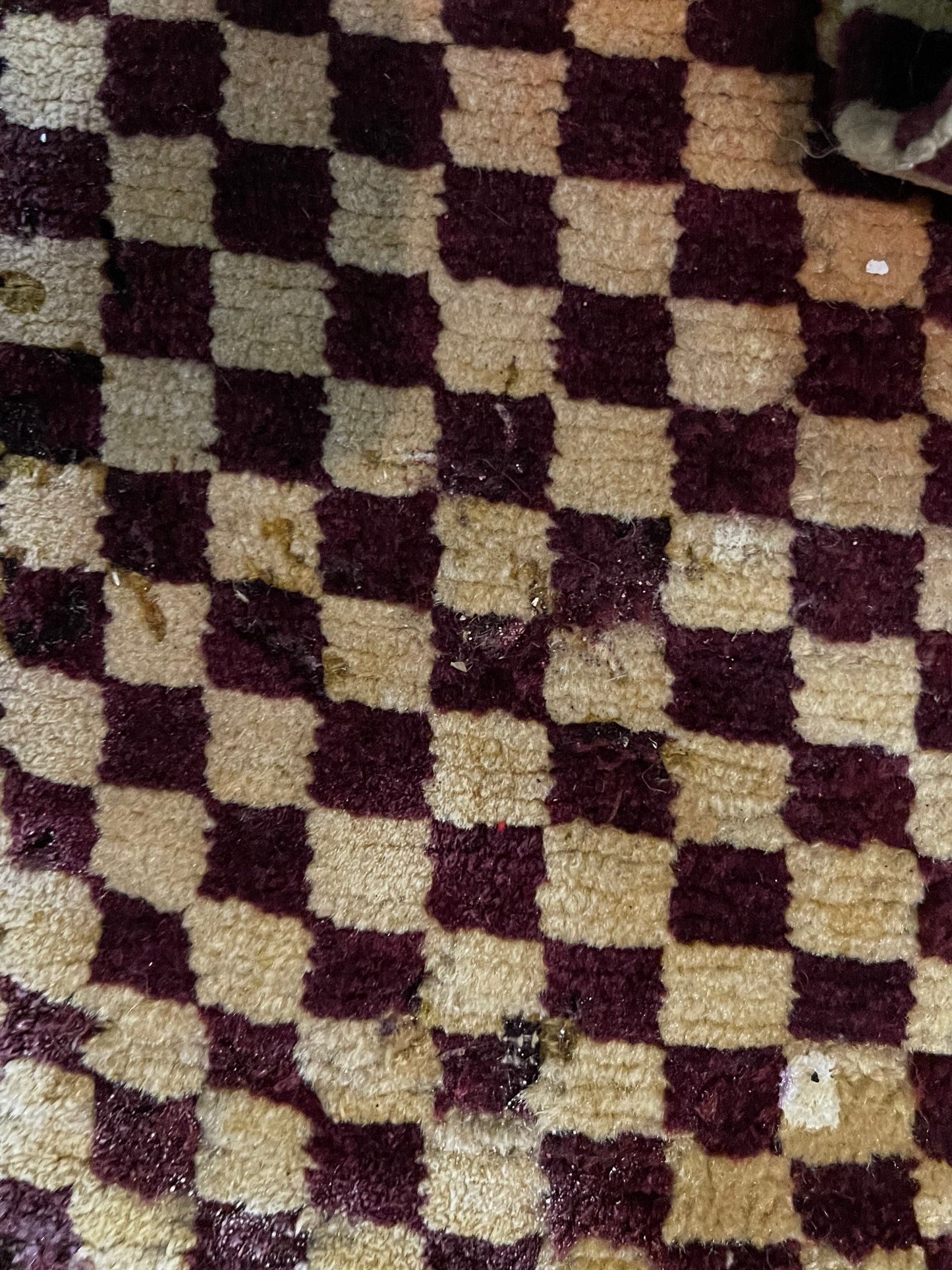 An antique Tibetan checkerboard handmade wool rug