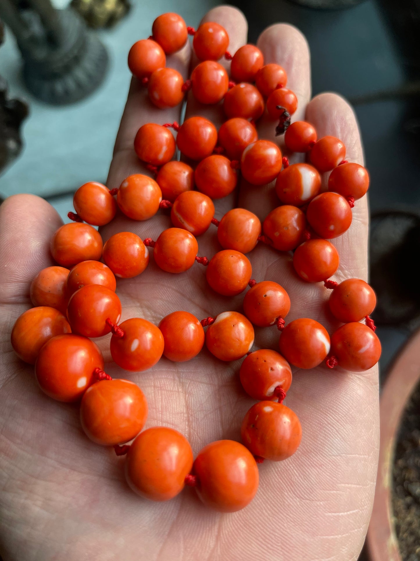 A necklace with vintage momo coral beads