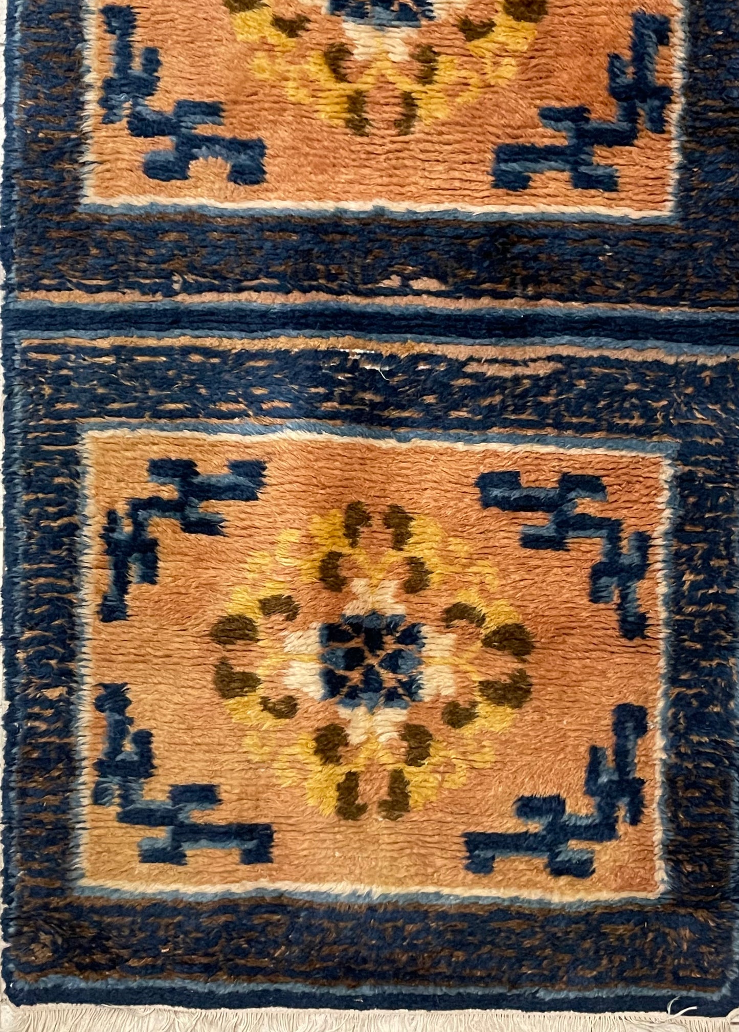 An antique triple seater Tibetan meditation rug